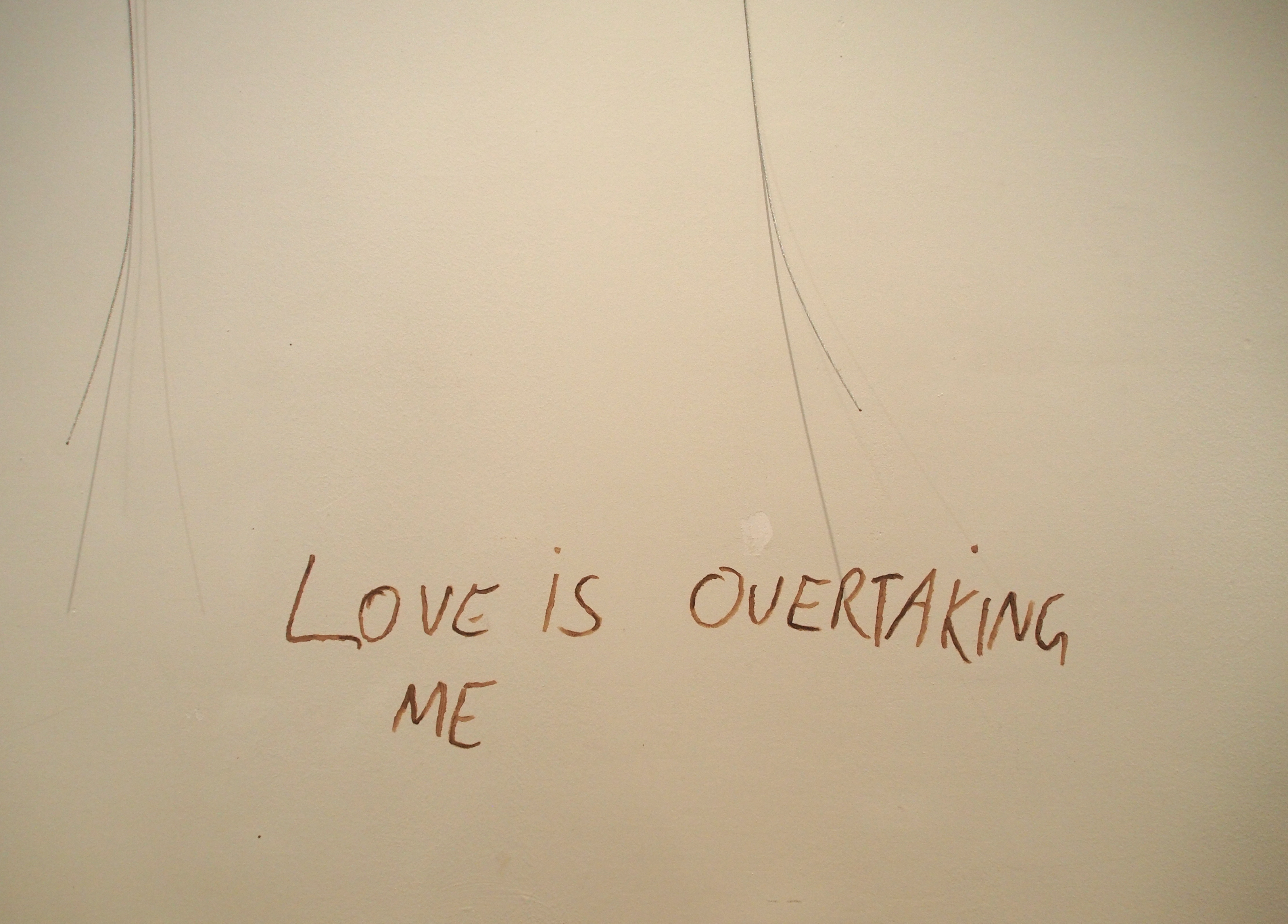 Love Is Overtaking Me (appropriated Arthur Russell lyrics), oil on wall, dimensions variable, 2018 