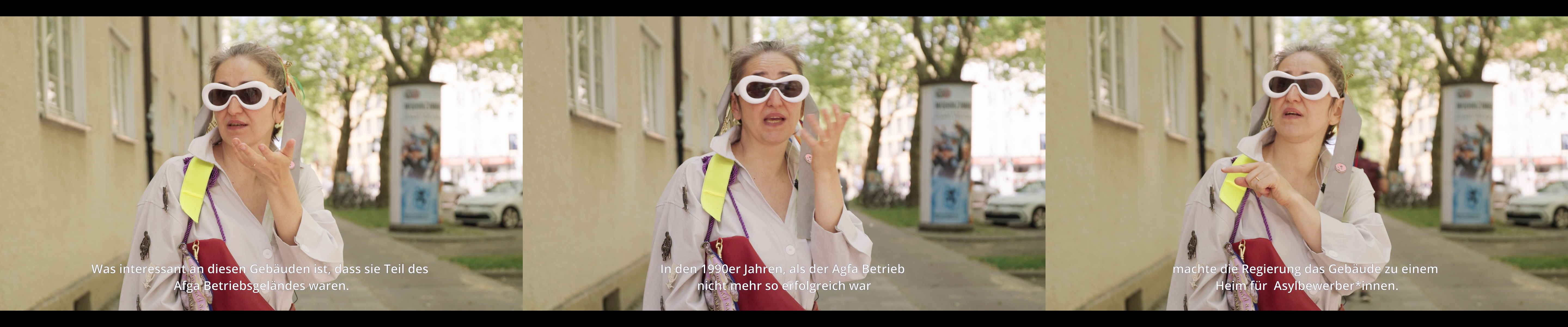 Video stills. The Memory Person goes in search of the exile and migration stories of former employees of the Agfa factory and their families. After the war, Agfa recruited numerous guest workers. In the years leading up to its insolvency in 2008, parts of the company premises were handed over to the Bavarian state, and a home for asylum seekers was set up in Untersbergstraße. Performer: Viviana Iacob. Untersbergstraße Giesing, 2023. Text on stills: 'What is interesting about these buildings is that they were part of the Agfa premises. | In the 1990s, when the Agfa business was no longer so successful | the government turned the building into a home for asylum seekers.' Performer: Viviana Iacob. Untersbergstraße Giesing, 2023. Images: Mathias Reitz Zausinger.