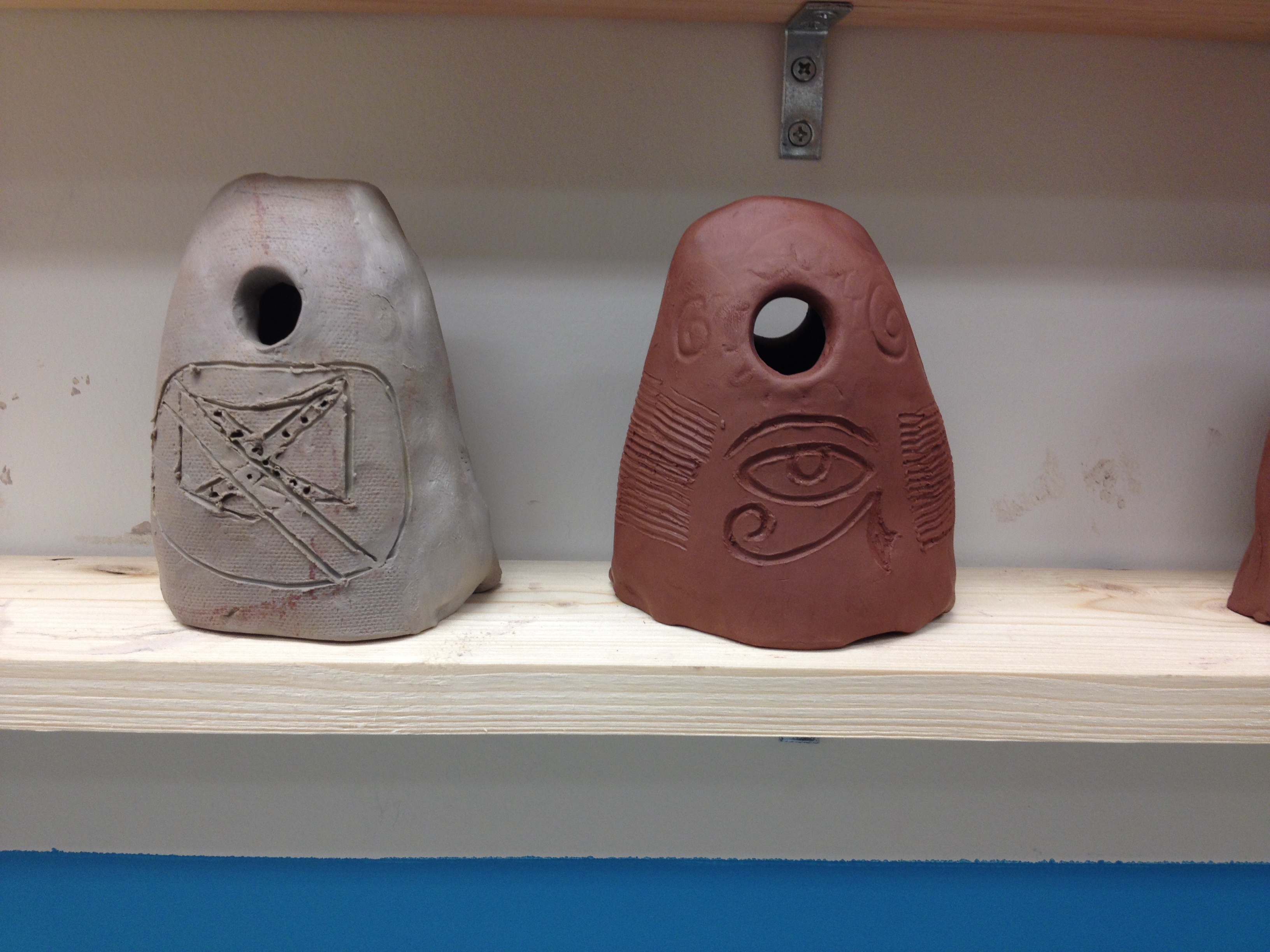 inscribed with the symbols of Mississippians and waiting to be fired in the kiln