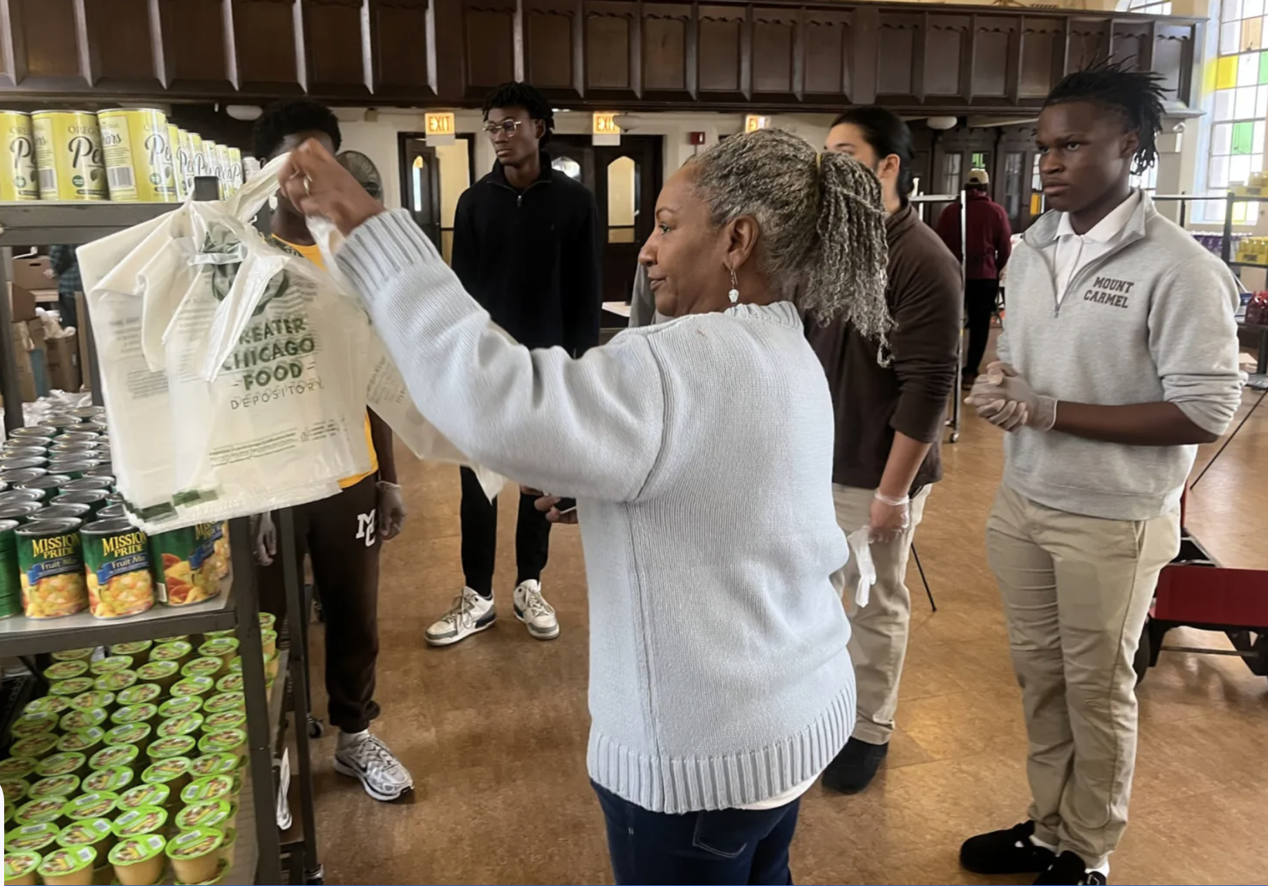 ‘We’ll be here’: Across three cities, communities step up as SNAP runs out