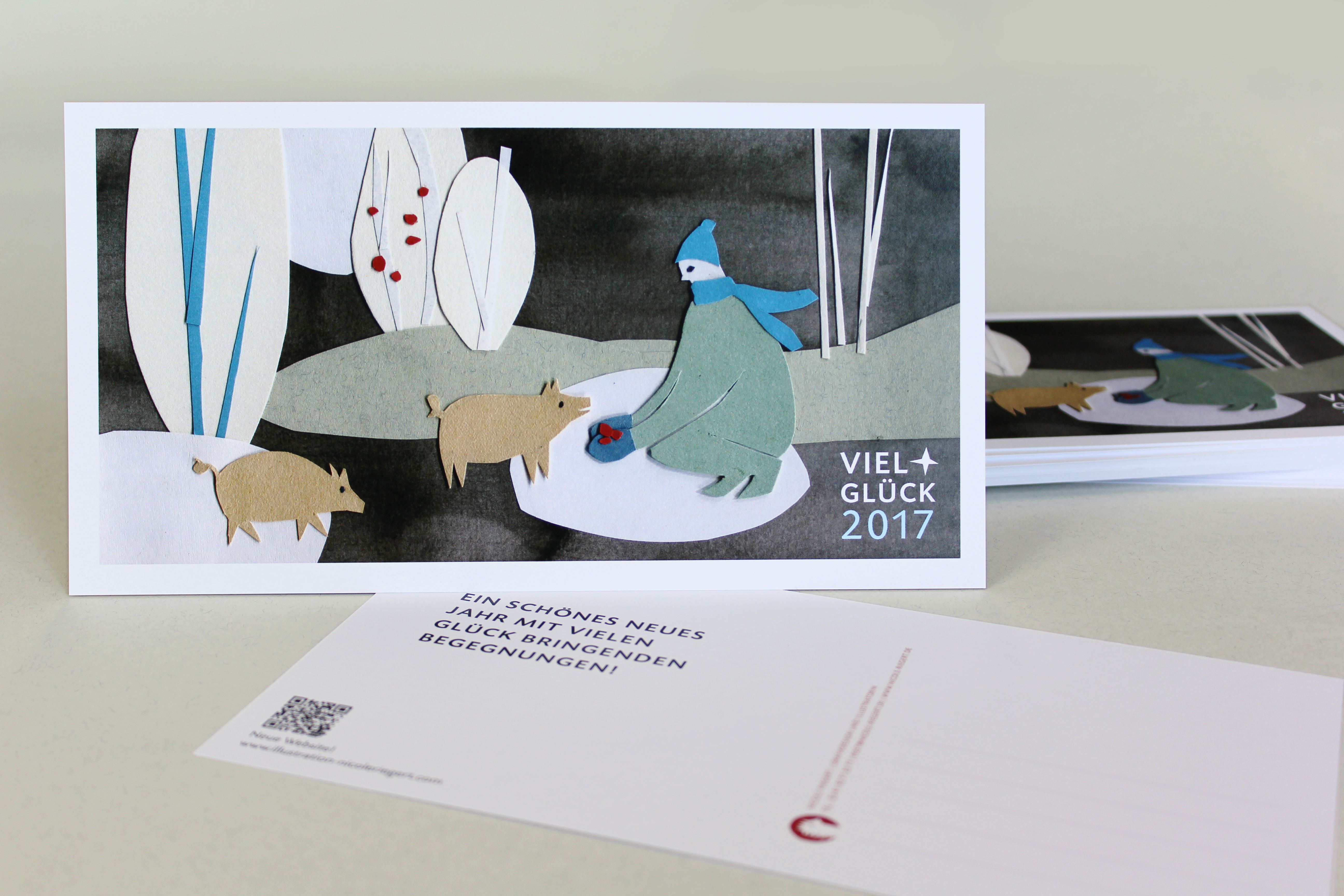 Neujahrskarte mit Papierschnittmotiv