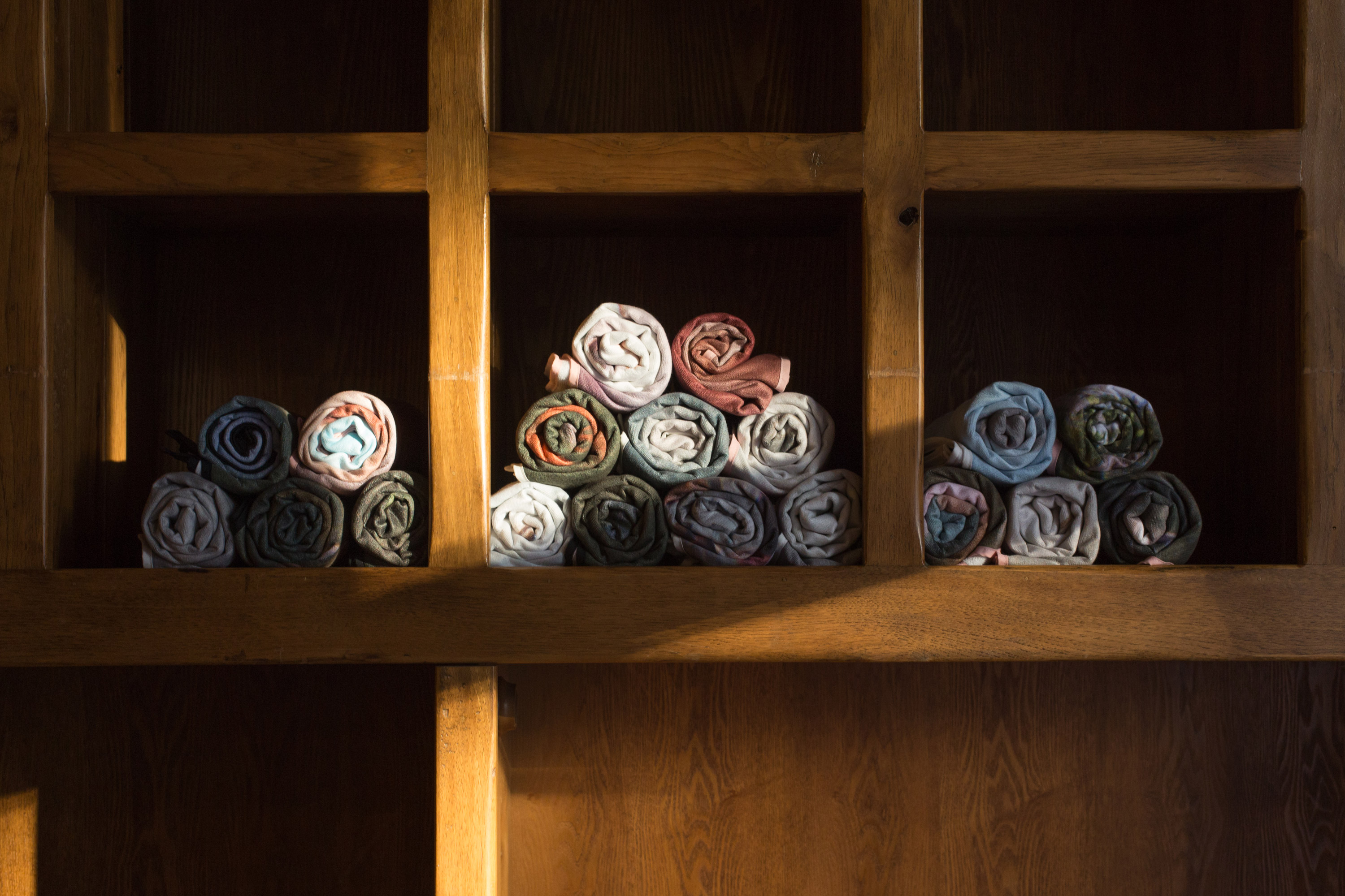 The Symbiotic Shore: Excerpts from IQECO Fire Island Image Archive (2019), Various Artists for the Institute of Queer Ecology. 44 towels, each 33 x 57 in (83.82 x 144.8 cm) Installation view of “The Symbiotic Shore” a group exhibition curated by the Institute of Queer Ecology (2021). Photo by Monica McGivern. Courtesy of the Institute of Queer Ecology, Bas Fisher Invitational and Bridge Initiative.