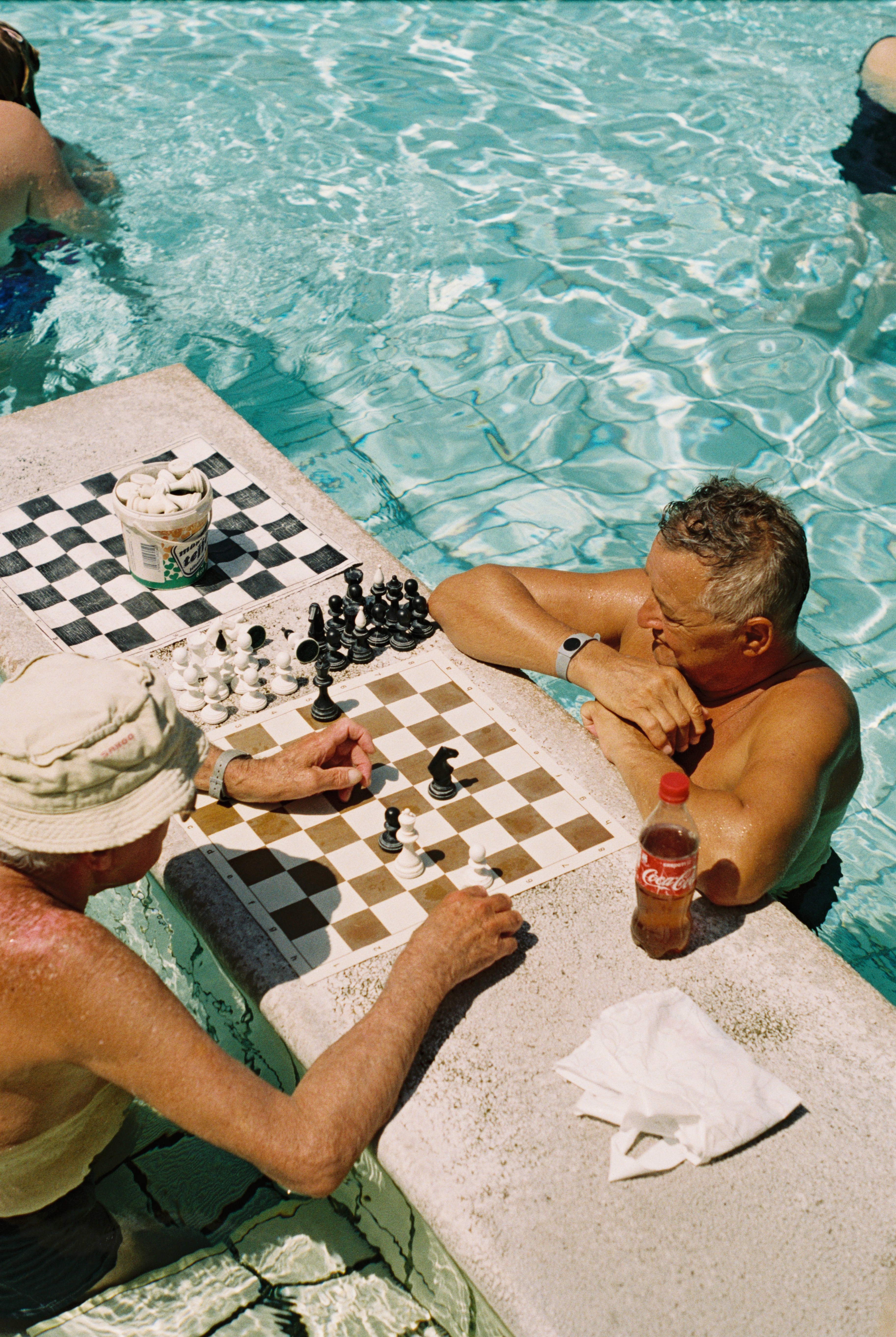 Men playing chess in Budapest swimming pool