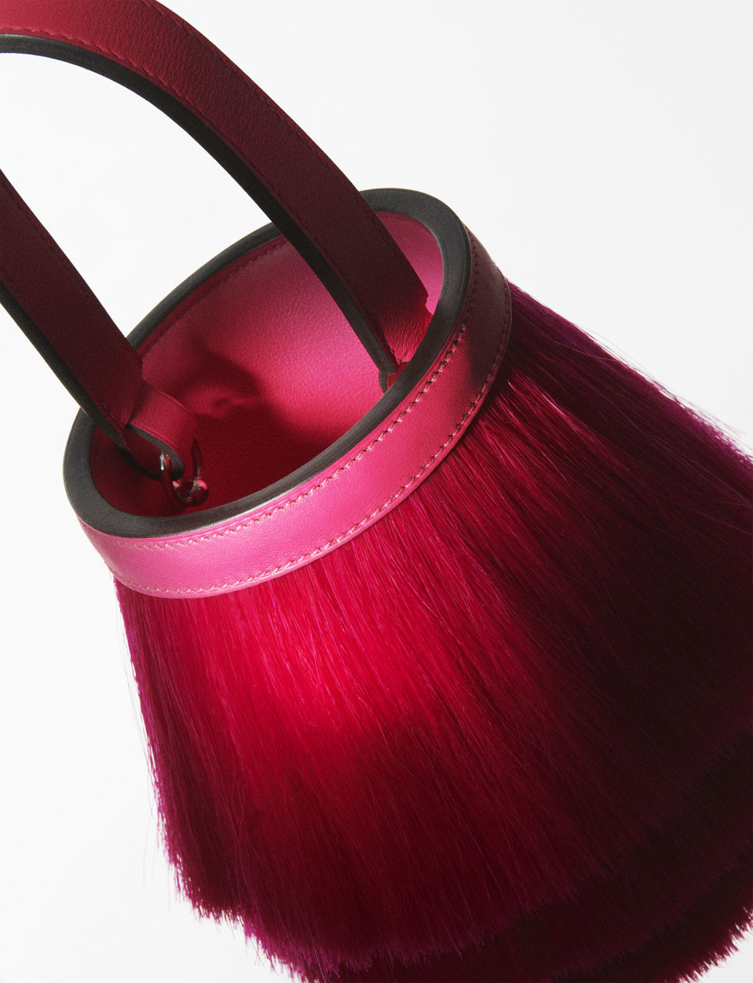 KMA photographer Martin Vallin shoots a pink Hermes Bucket handbag for Plaza Magazine.