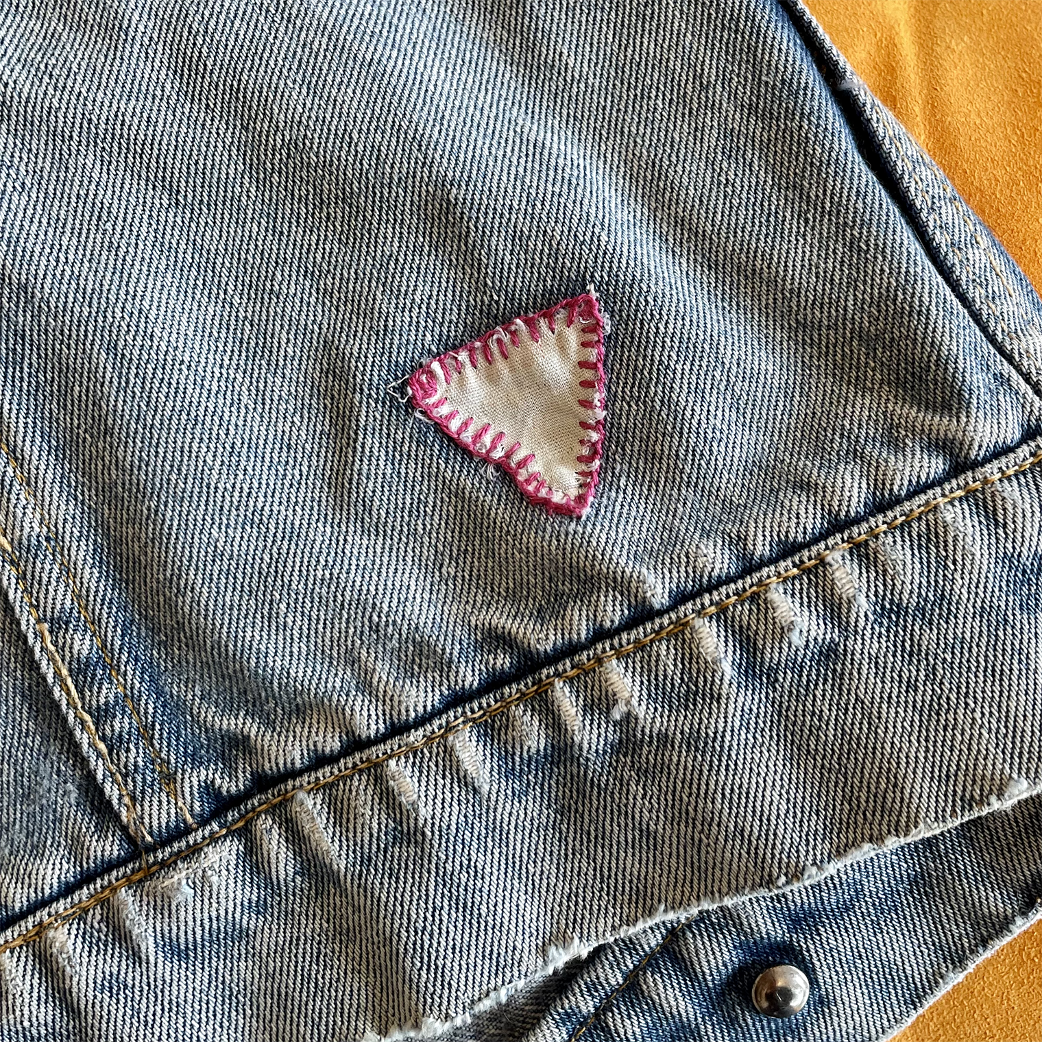 Logo repair on Vintage Fiorucci Jacket for Eva Joan Repair