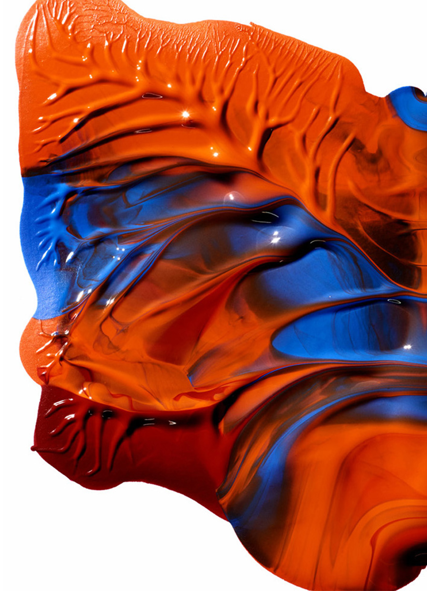 Photography agency KMA / King Management Agency stylist Sara Wacksman creates melted Dali shape using blue and orange paint.