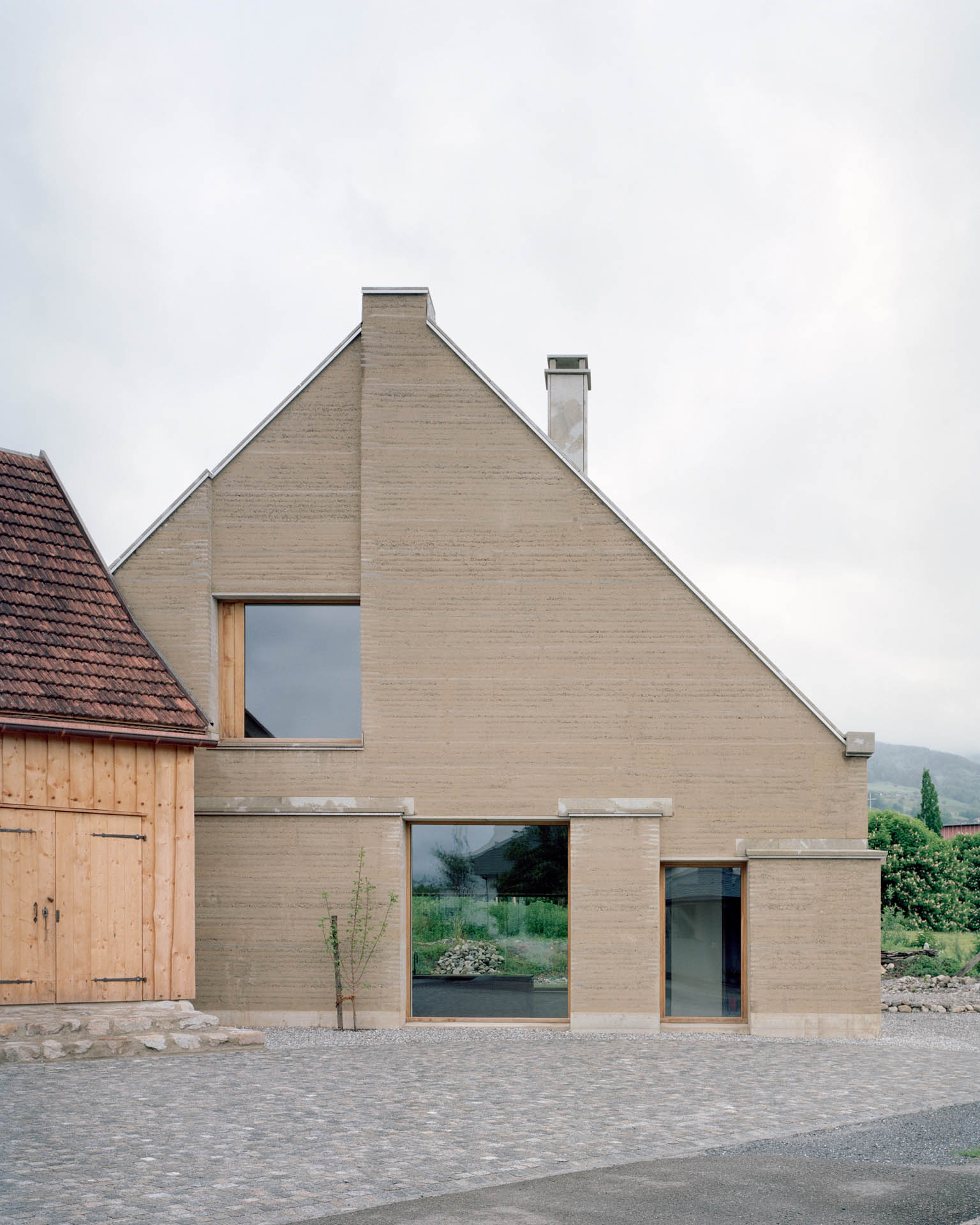 005 Hausverschiebung + Stampflehmbau, Gässli5, Grabs