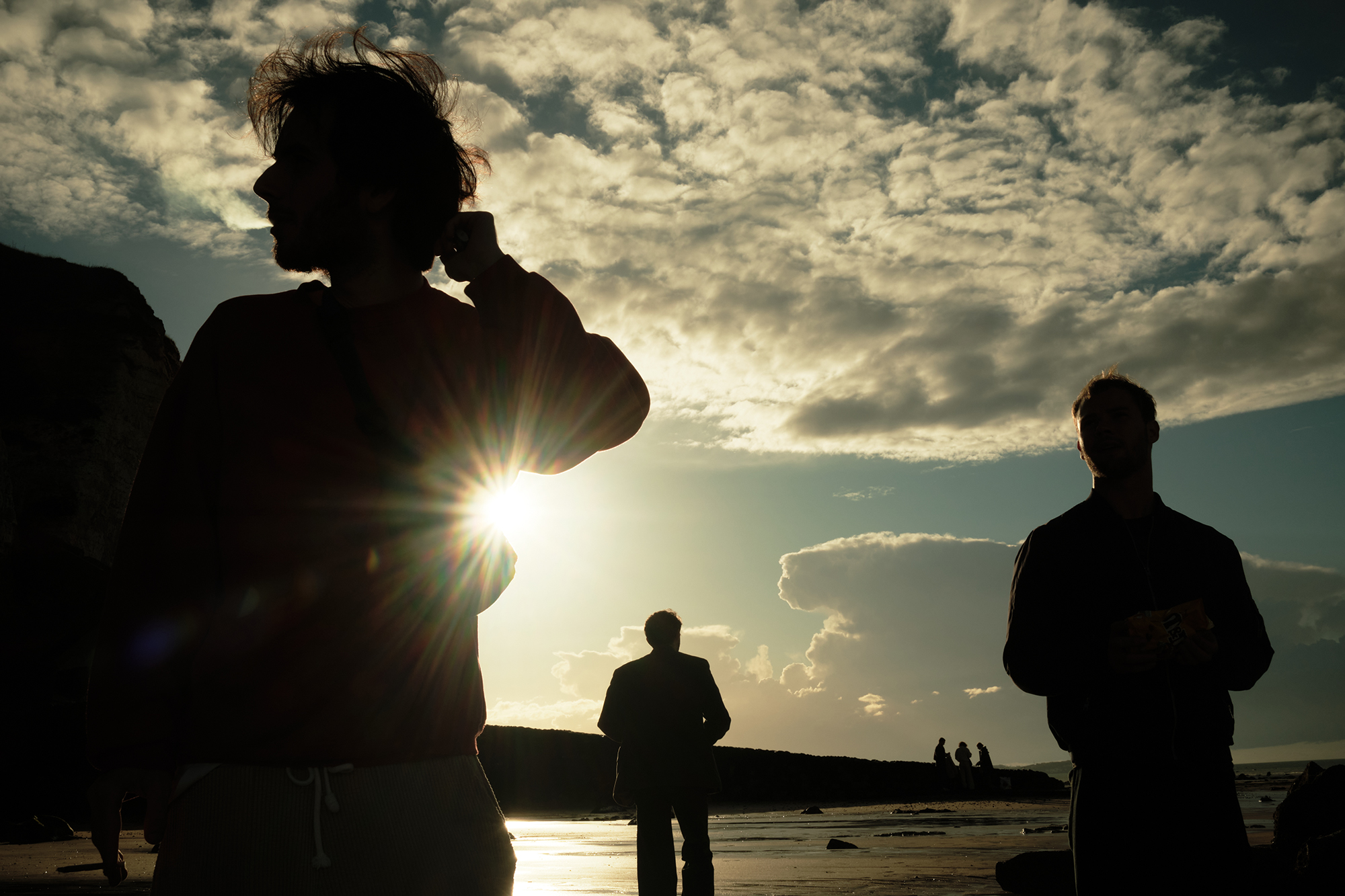 Philippe Sarfati-set photography-photographer-photography-street-documentary-music video-michael chereau-blindfold-at mos-france-film-crew-silhouette-beach-golden hour-clouds
