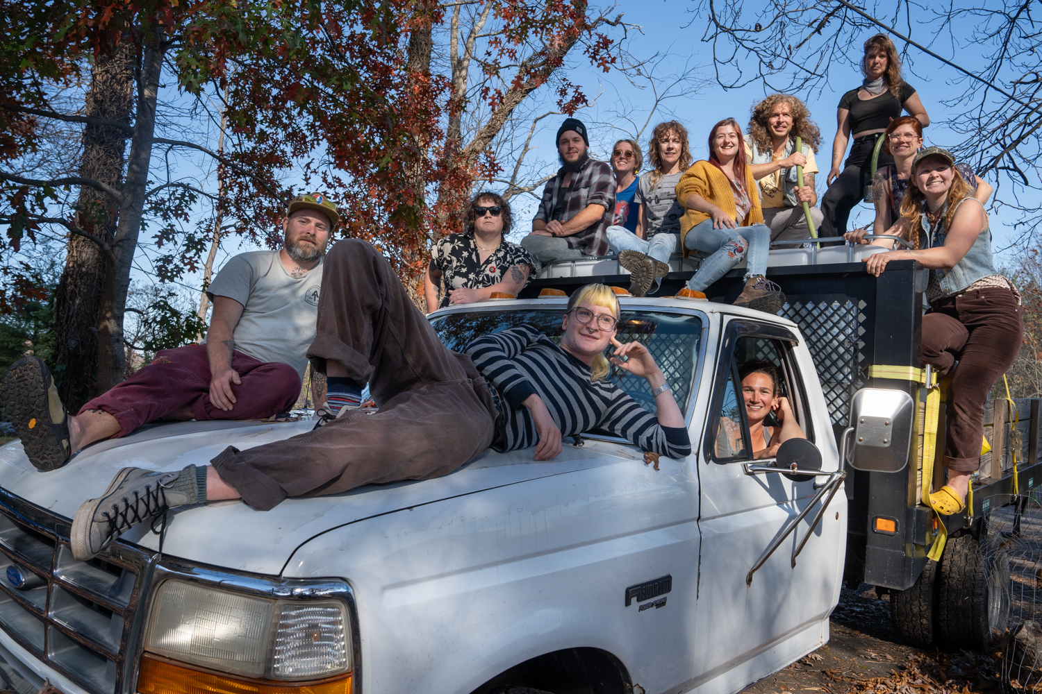 BeWell members atop the truck they use to deliver water across Asheville. Nov. 11, 2024
