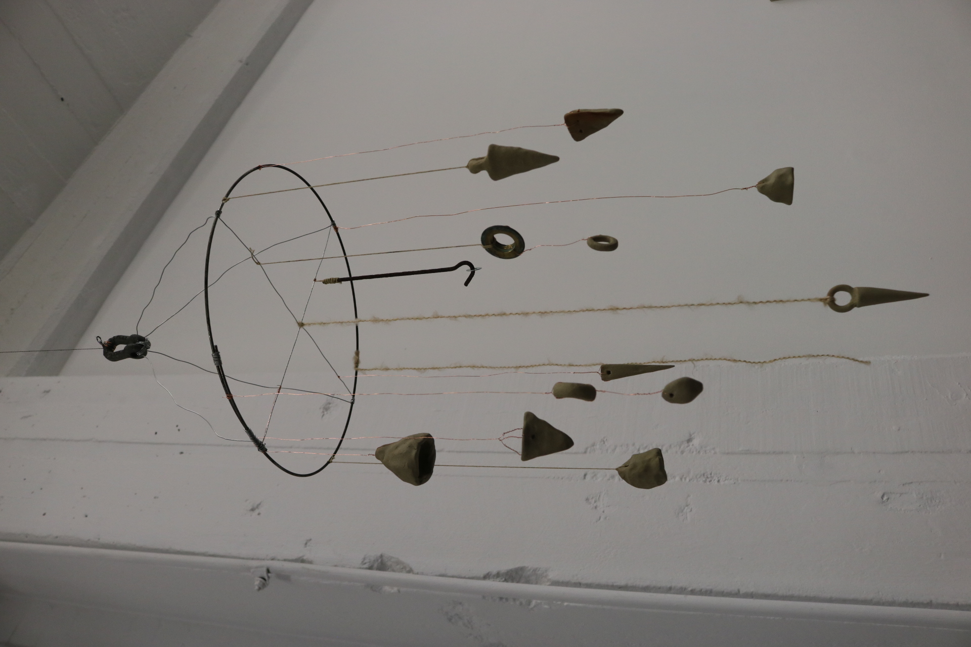 Dowser. Ceramic, found objects, copper wire, no. 8 wire, wool. 2023, Dimensions variable