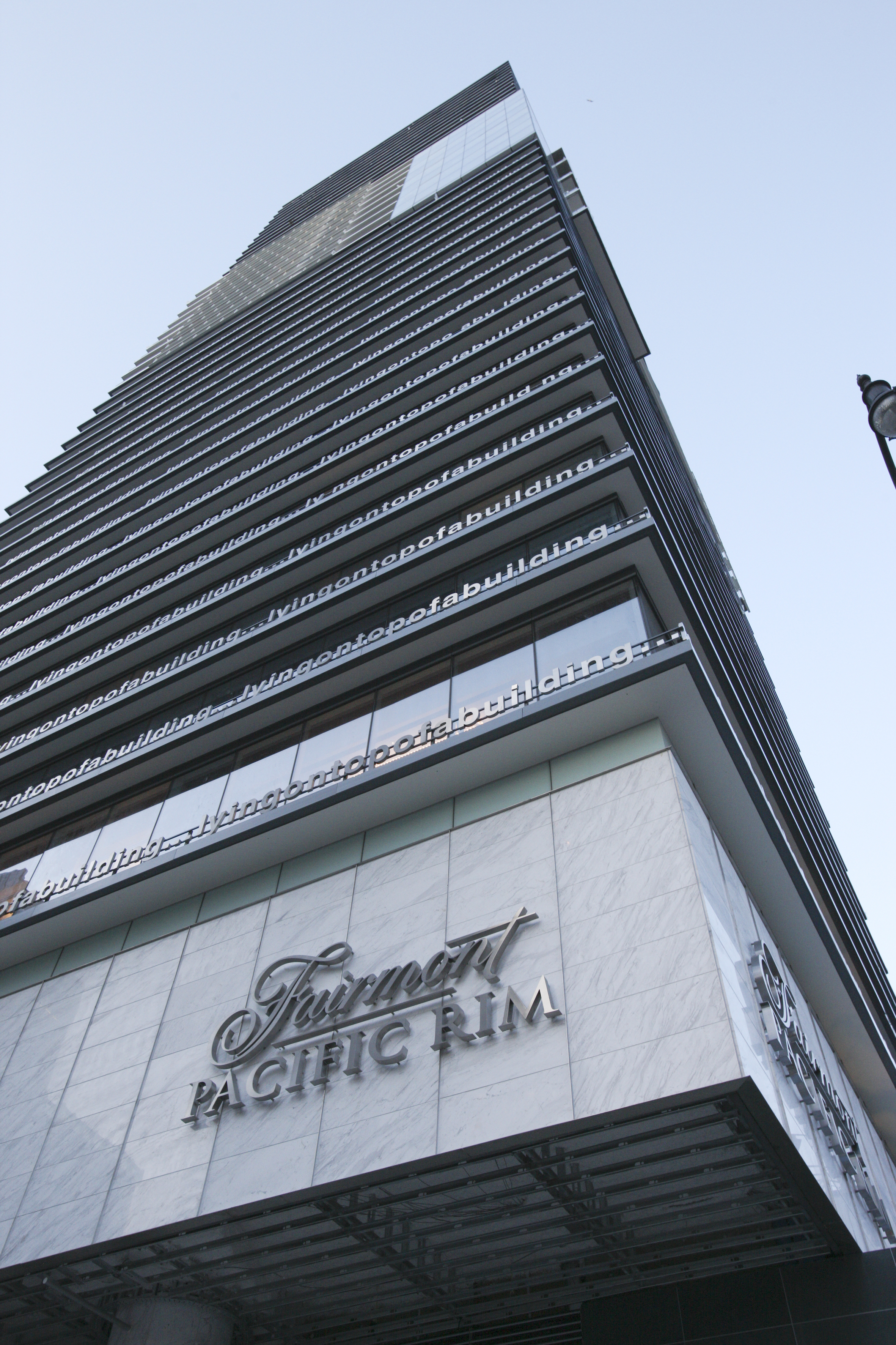 Lying on top of a building the clouds looked no nearer than when I was lying on the street, Fairmont Hotel, Vancouver, 2008