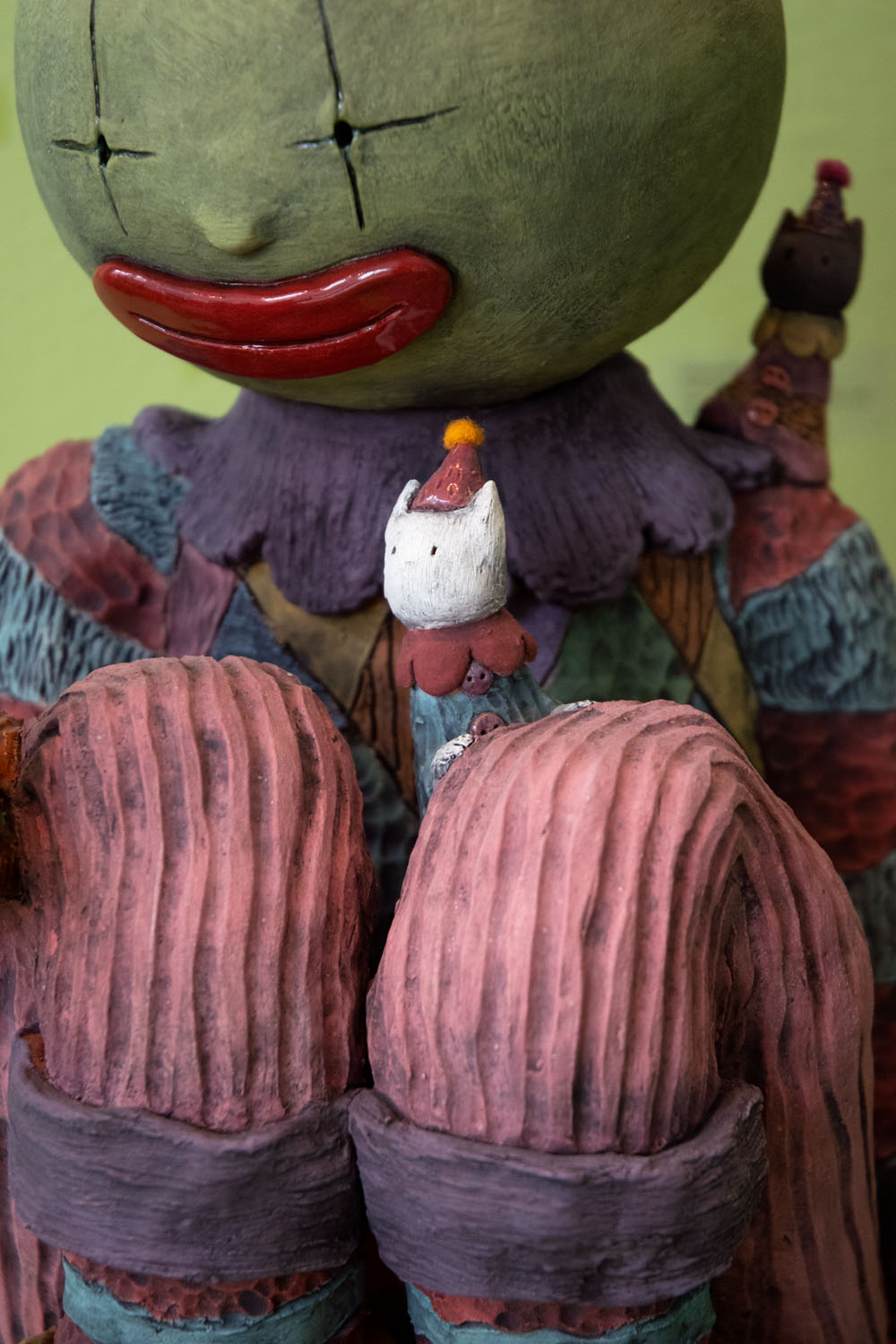 Hob and the Miaousprits (detail)  low fire clay, underglaze, wool roving, pom pom, 9” x 11” x 17.75” 2022 