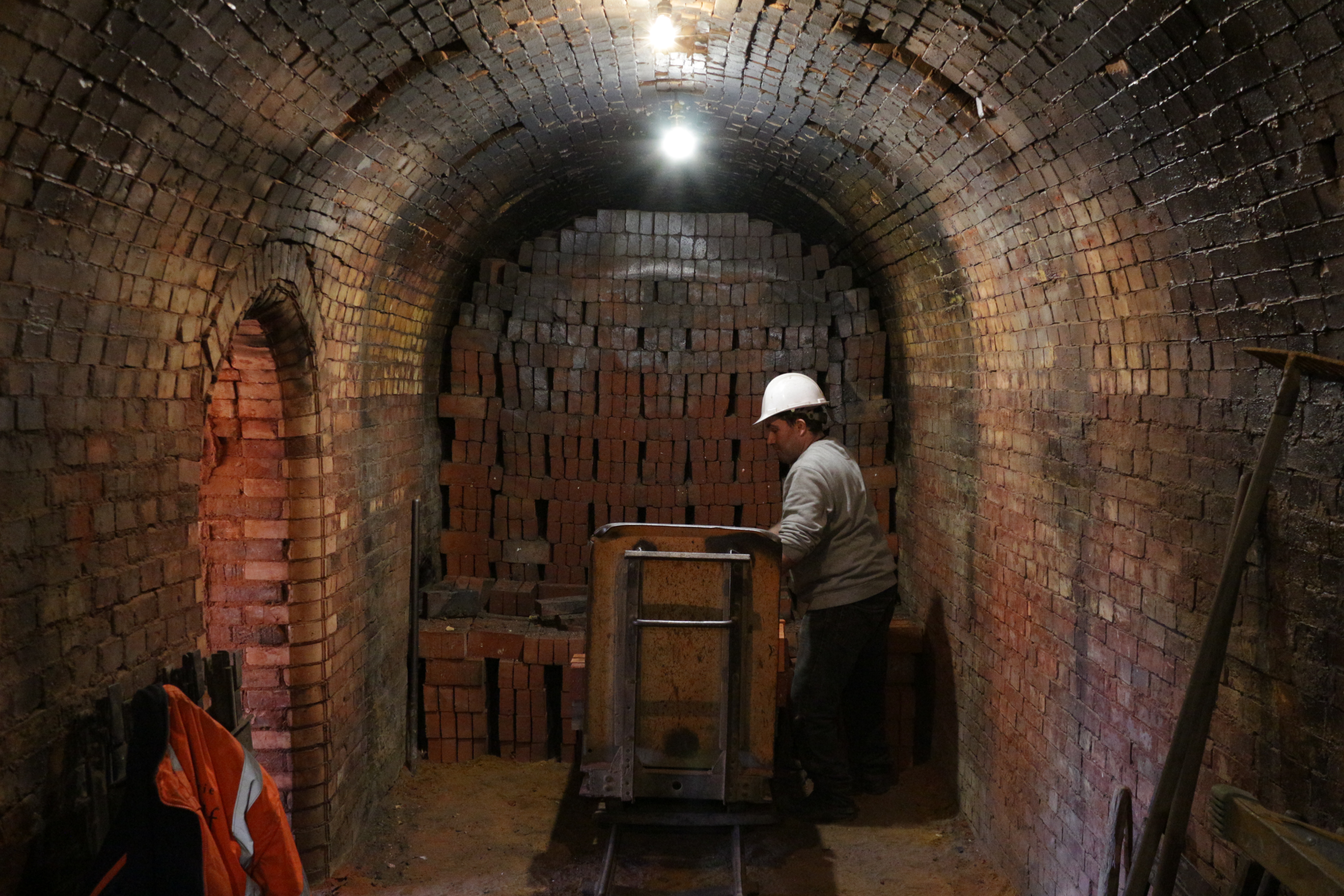 Bricks are collected and taken out on trolleys. They will be then sorted according to their aspect