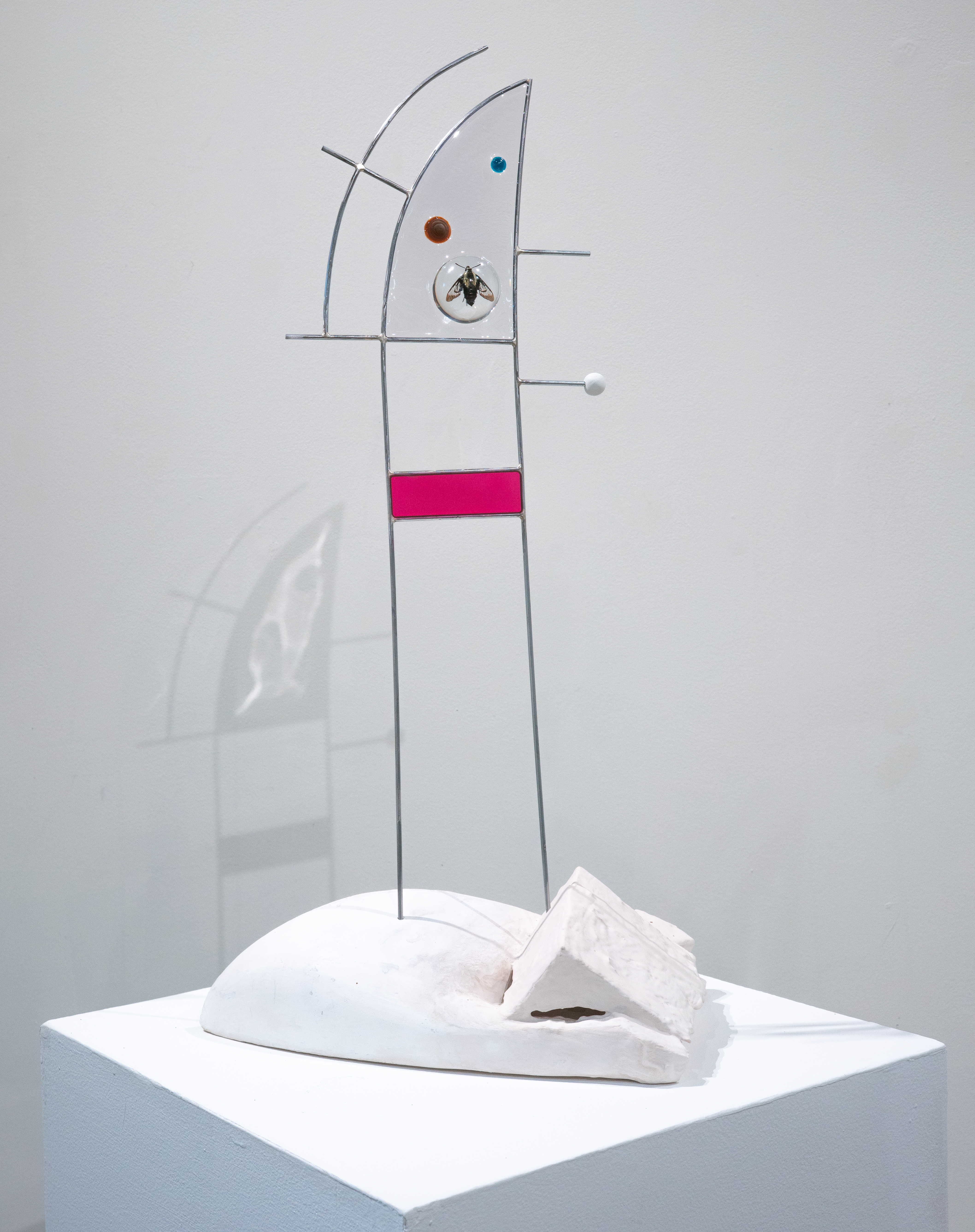 Uncertain Logic, 2025, Steel (from salvaged election signs), epoxy resin, foam, plaster, preserved moth, 28 x 15 x 9 inches