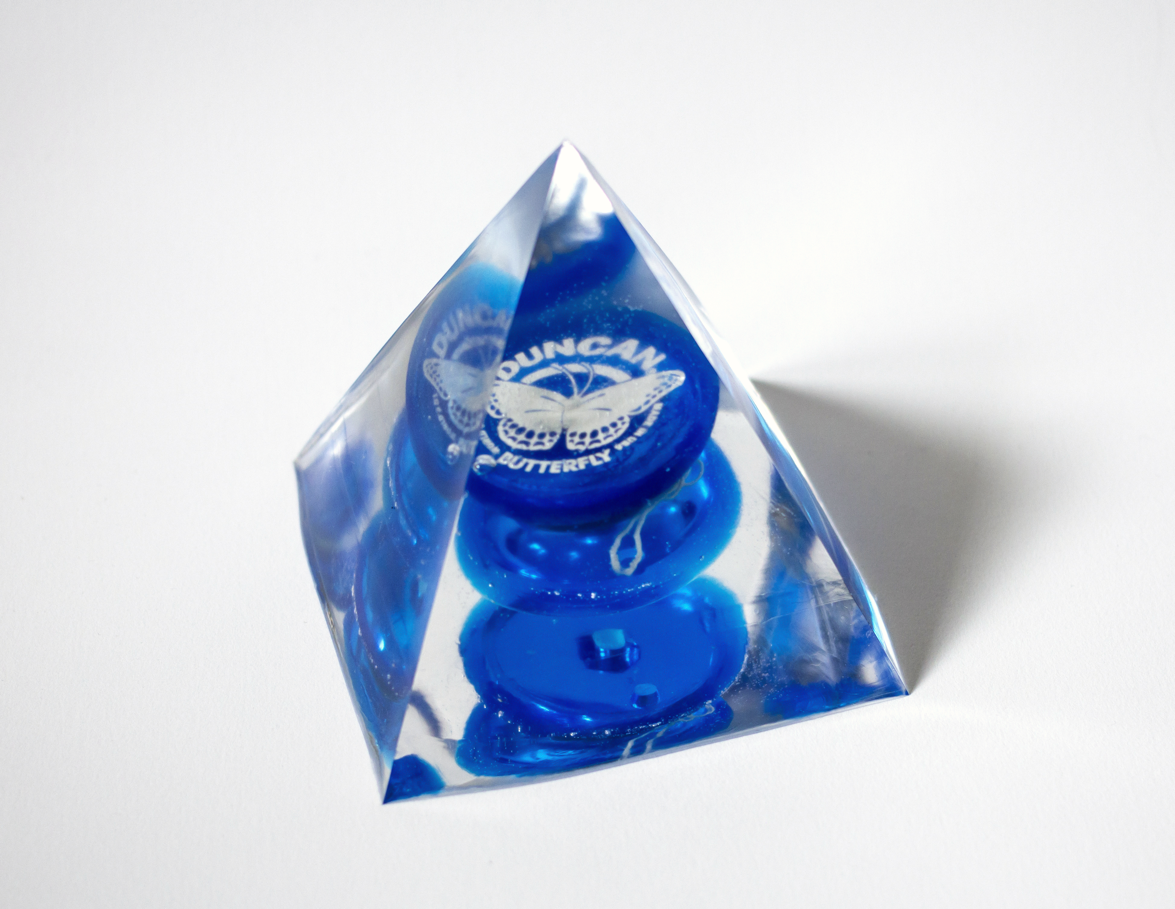 Butterfly, 2020, 4"x4"x4". Duncan Butterfly yo-yo, epoxy resin