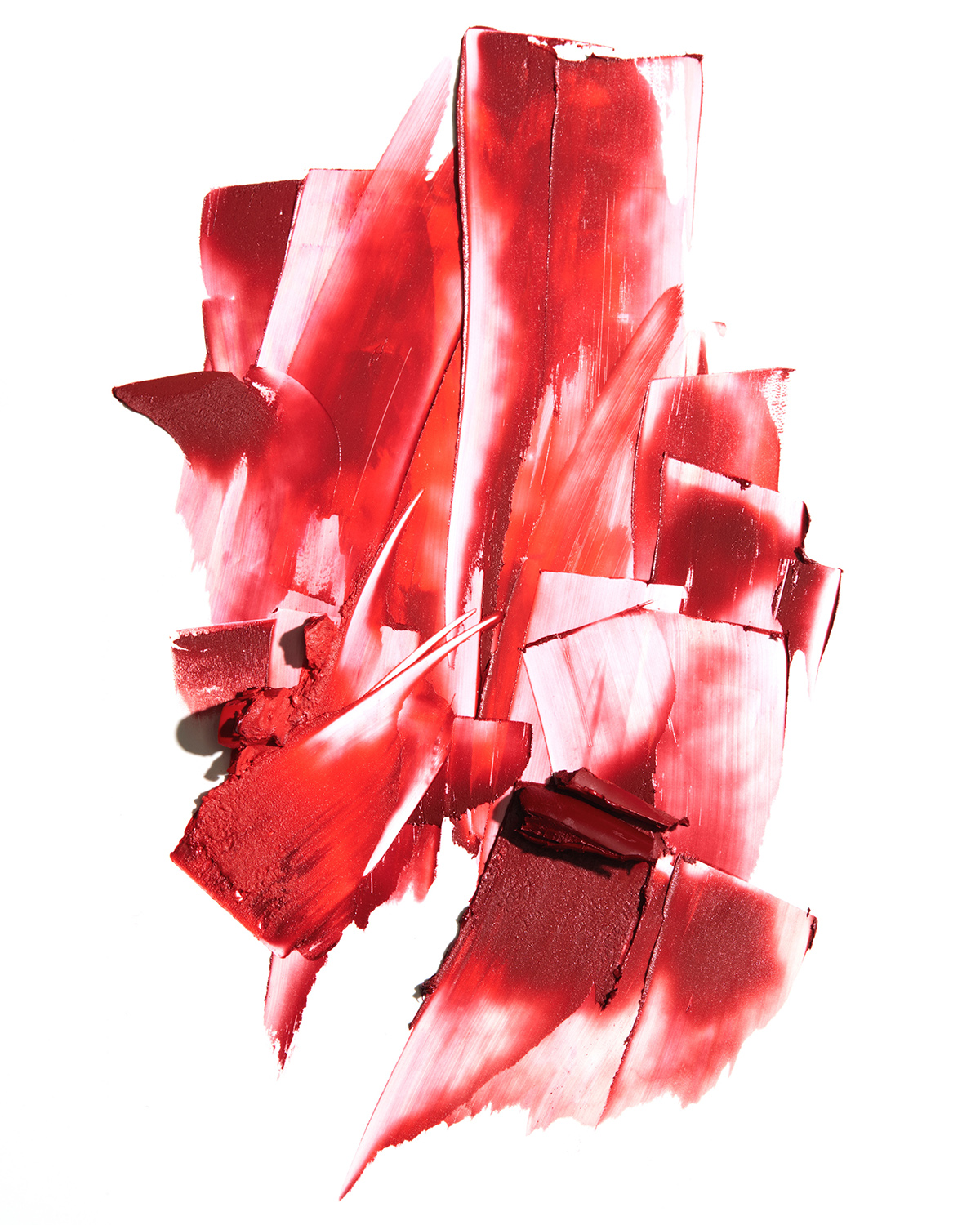 Photography agency KMA / King Management Agency stylist Sara Wacksman styles red strips using Kjaer Weis red lipstick. 