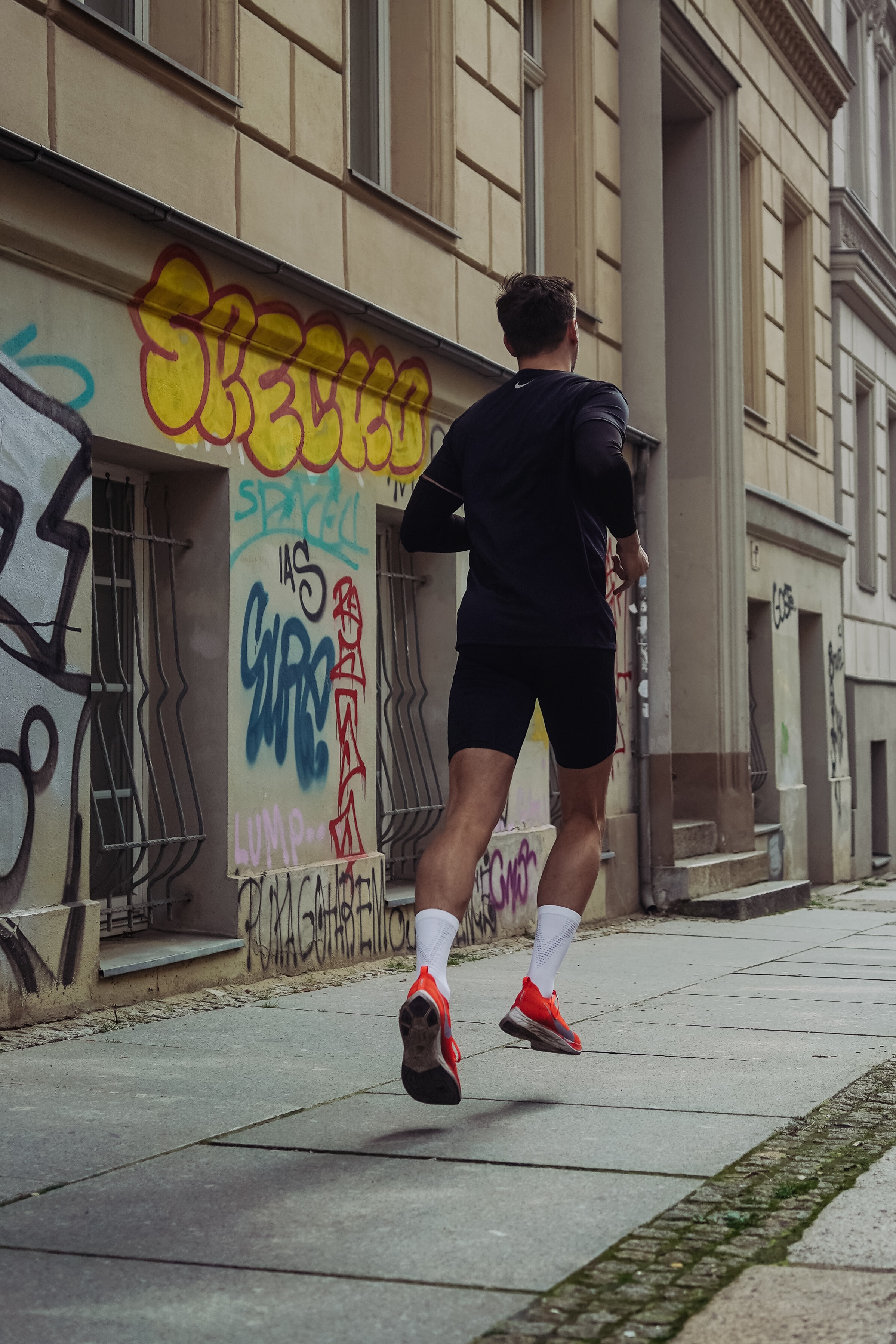 Man running listening to a podcast
