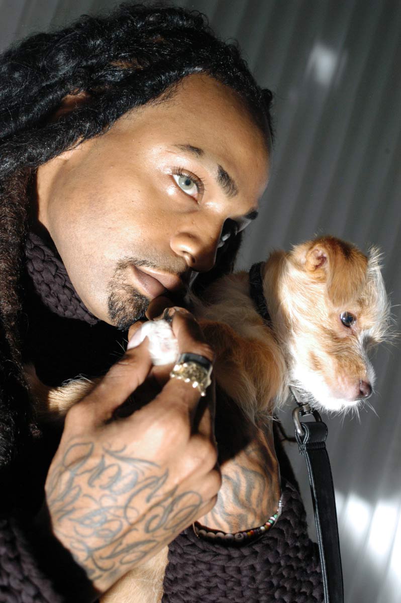 Ian Isiah with puppy