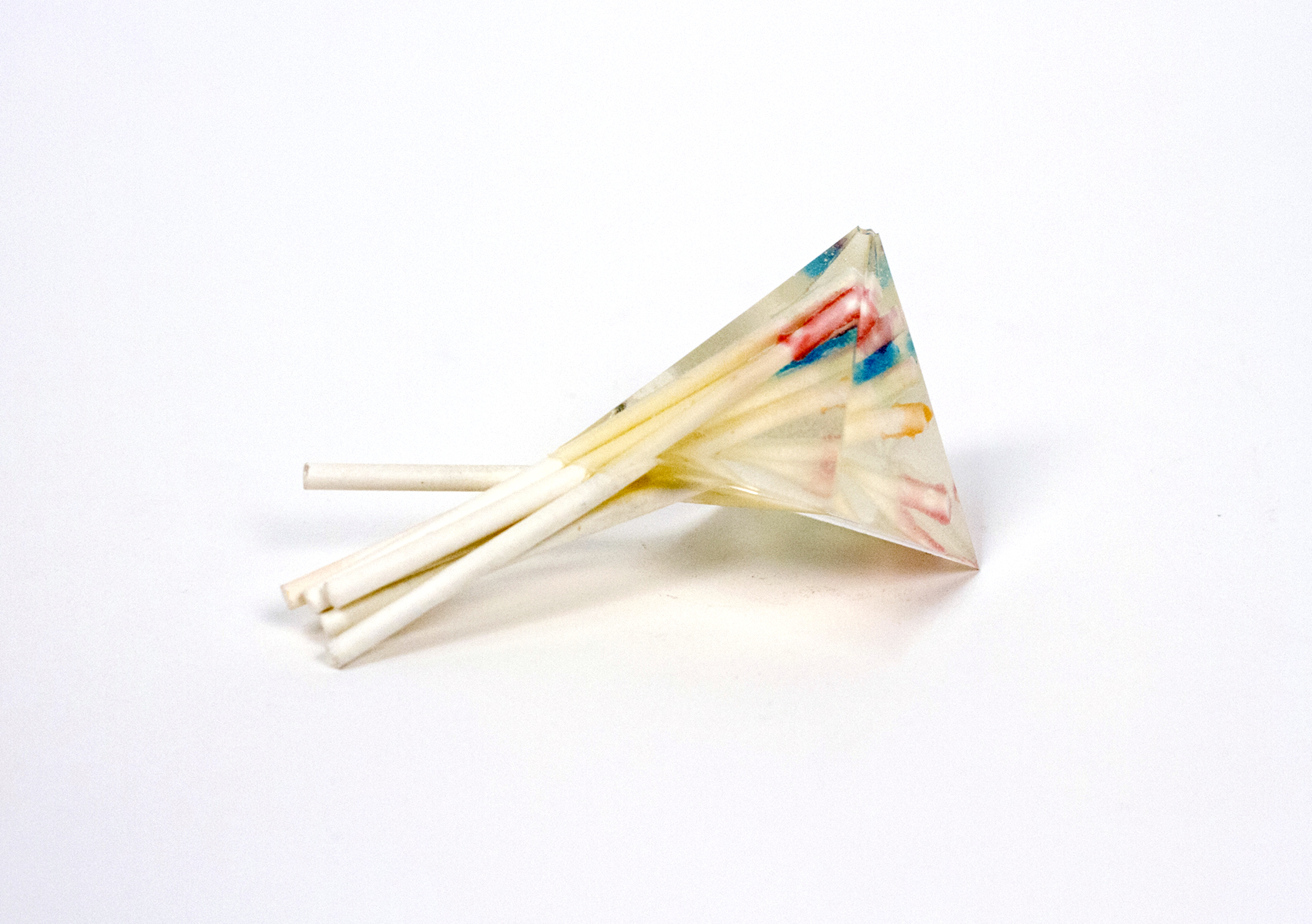 Sucker (7 Dum Dums), 2019, 3"x1.5"x1.5". Lollypop sticks, candy, epoxy resin