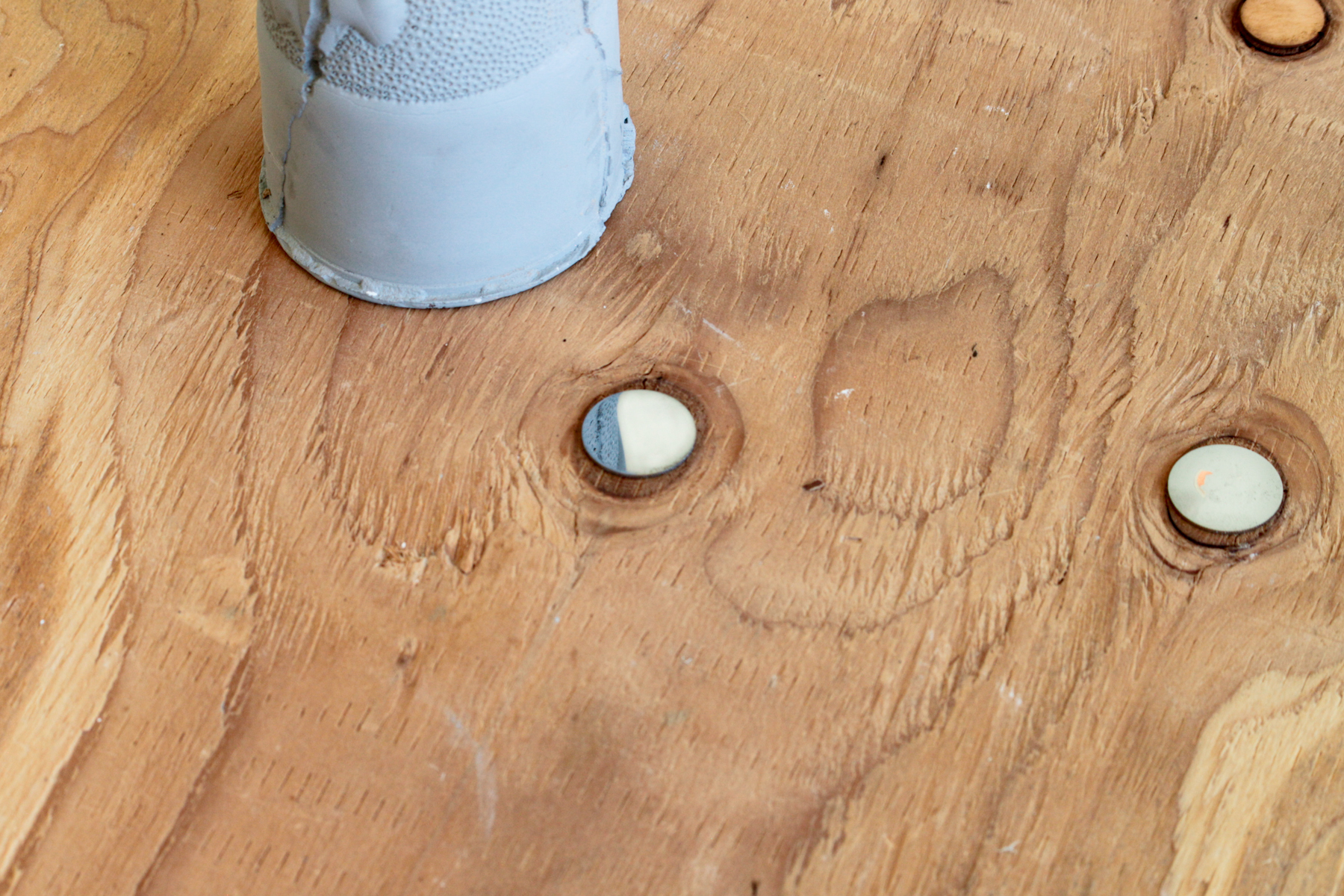 Infinite ullage, 2017, coins defaced to the point of becoming mirrors