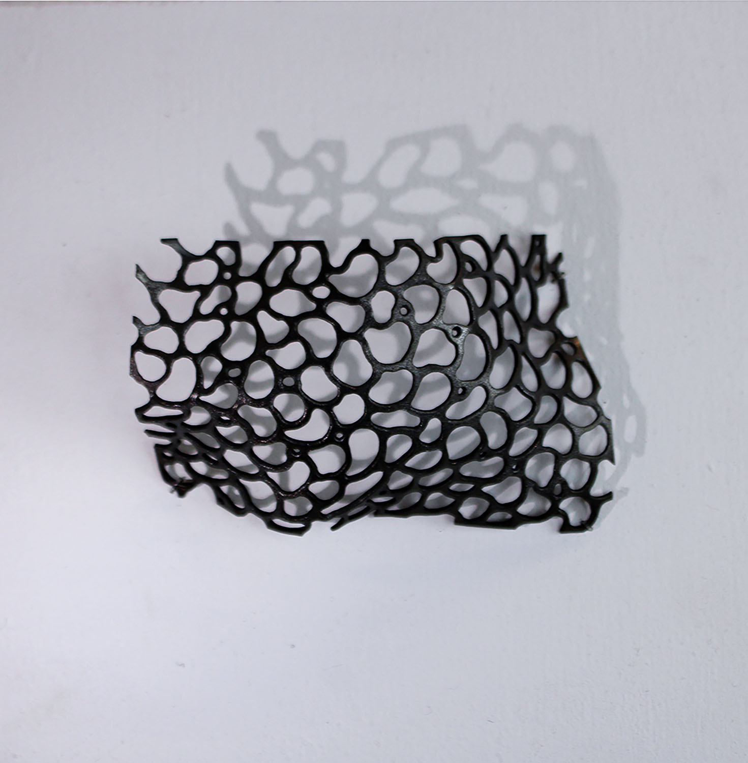 untitled  Pierced copper, 4" x 2.5" x 1.5" 2021 