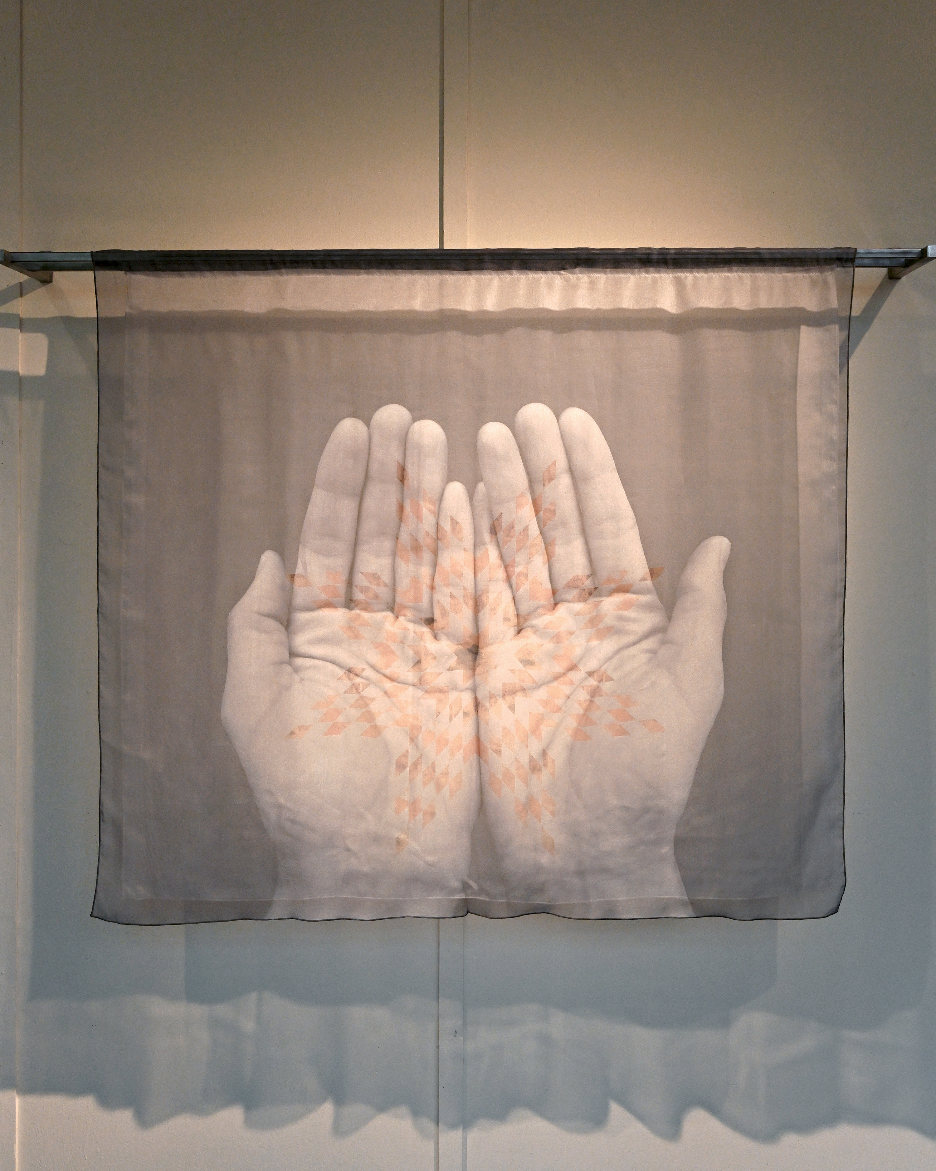 Knowledge (2025), muslin, silk, metal. This installation is currently on display at Idyllwild Arts Academy, and features photographs created by students as a part of a Site Specific Photography workshop held on Indigenous People's Day.