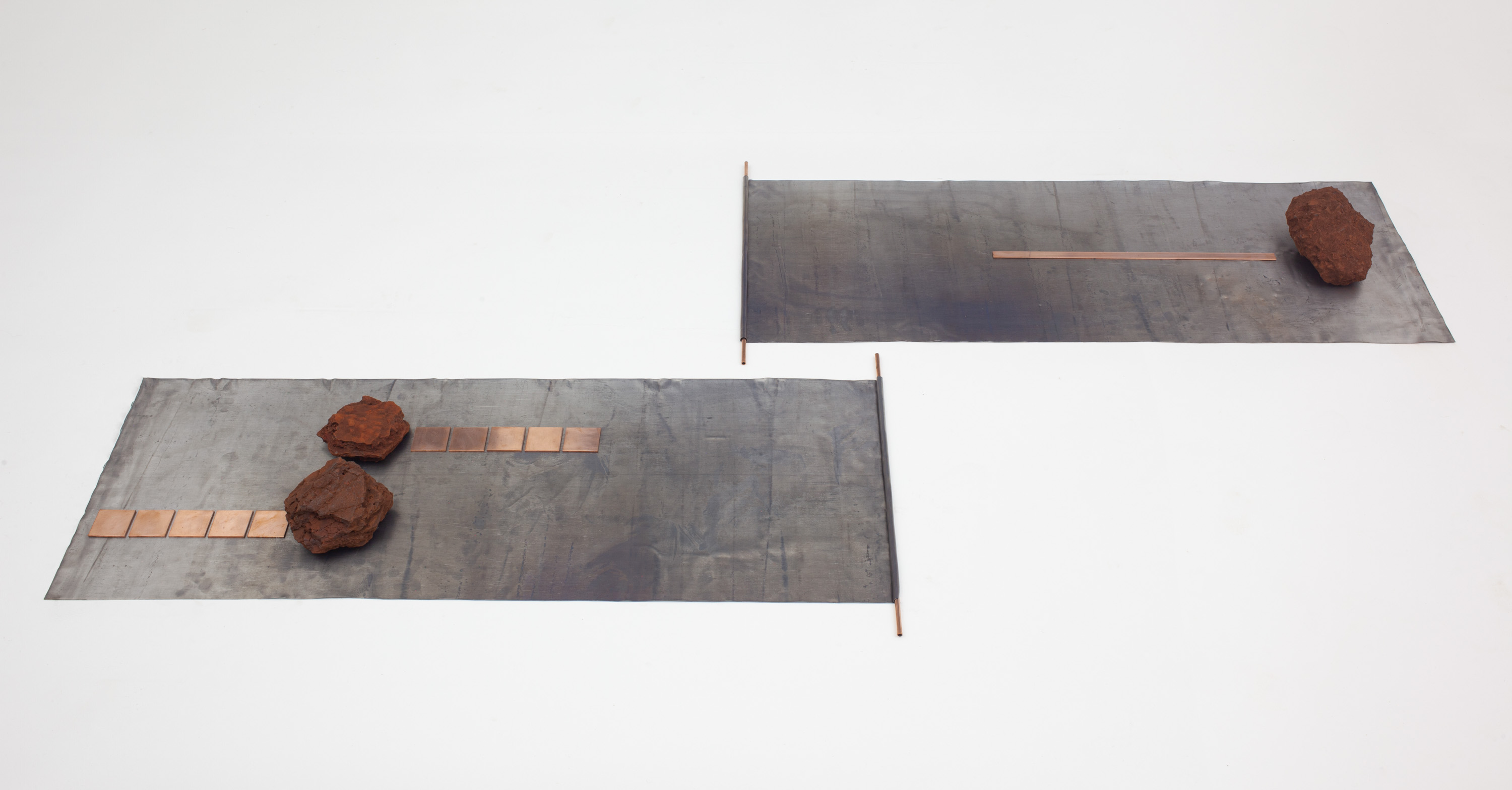 LUNAÇÕESChumbo, cobre, pedras de minério de ferro. 195 x 98 x 9 cm. 2023