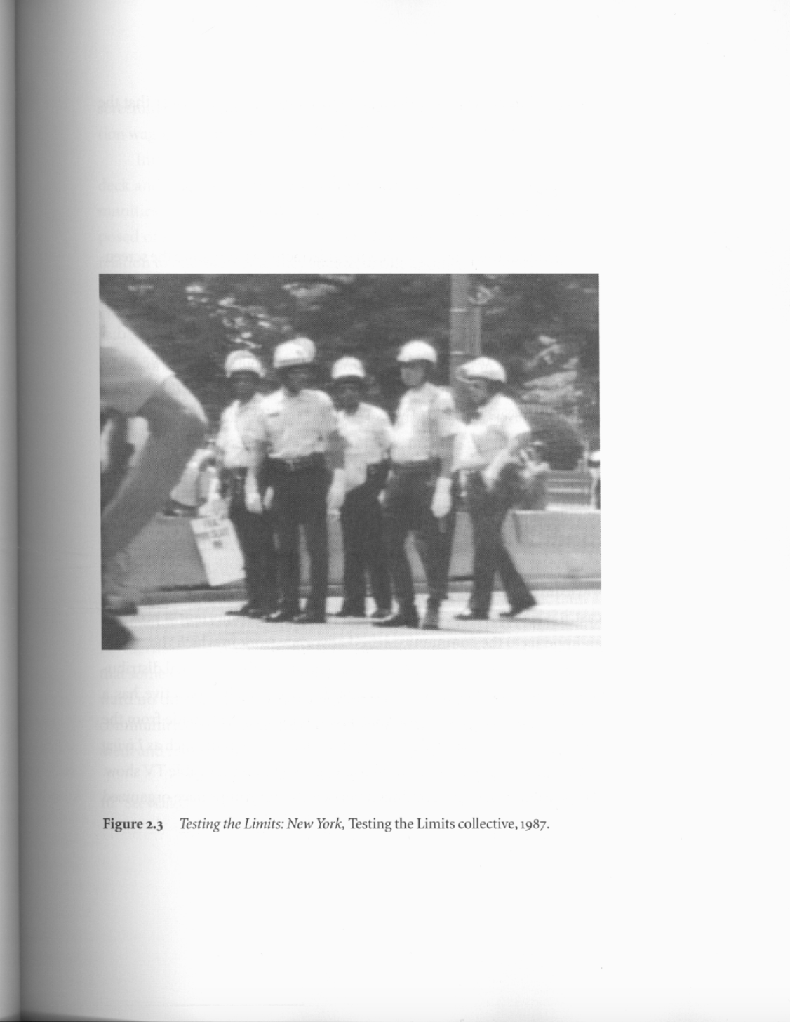 a scanned image from a page of the text, "picture a coalition", shows a greyscale image of cops in helmets gathered in a group.