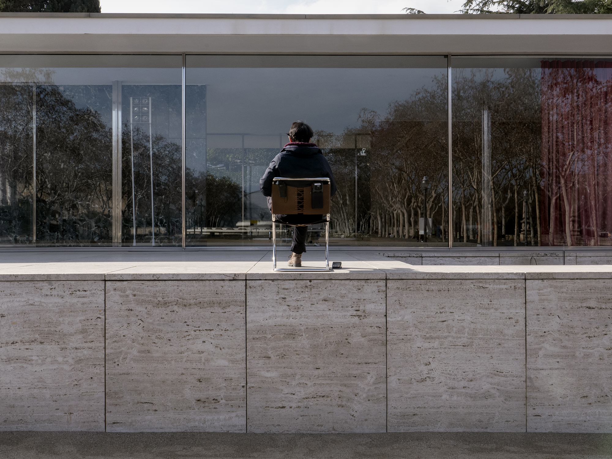 Guard and dataphone in the Mies van der Rohe pavilionBarcelona, Spain, 2024