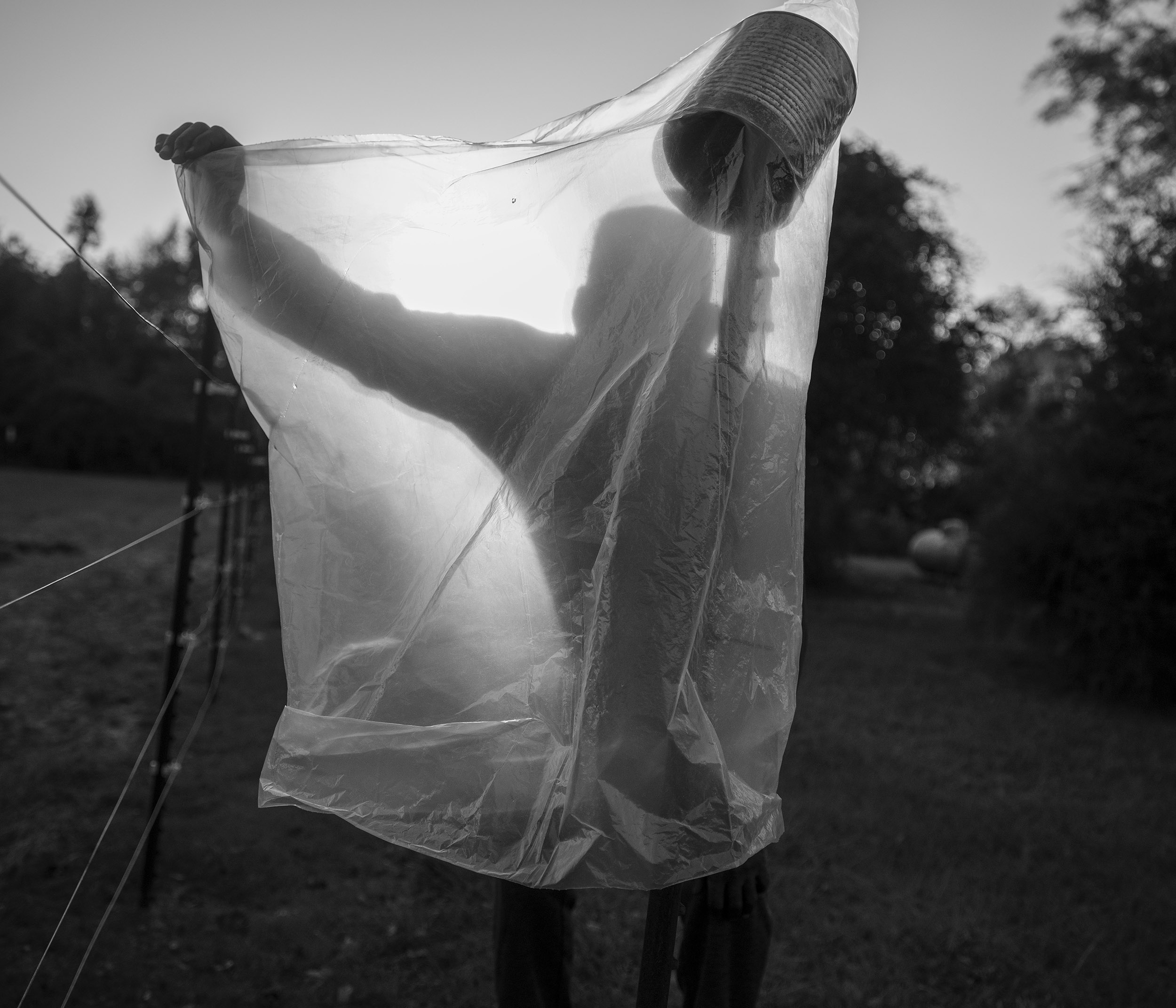 Spring Hill, Barbour County, Ala. Michael Farmer, 57, fashions a scarecrow next to his garden on Election Day. 2020. // Michael Farmer’s family has lived in Spring Hill for generations, where the predominantly Black community has faced a history of racial violence and voter disenfranchisement. On November 3, 1874 a white mob attacked the Spring Hill polling station, destroying the ballot box, burning the ballots, and murdering the election supervisor’s son. Farmer is a lifelong Democrat and military veteran who served two tours overseas in Operation Desert Storm and Operation Iraqi Freedom. When asked what he hoped might come from the 2020 presidential election, Farmer said, “I hope the young folks might think about what their ancestors came through to get where we are.”