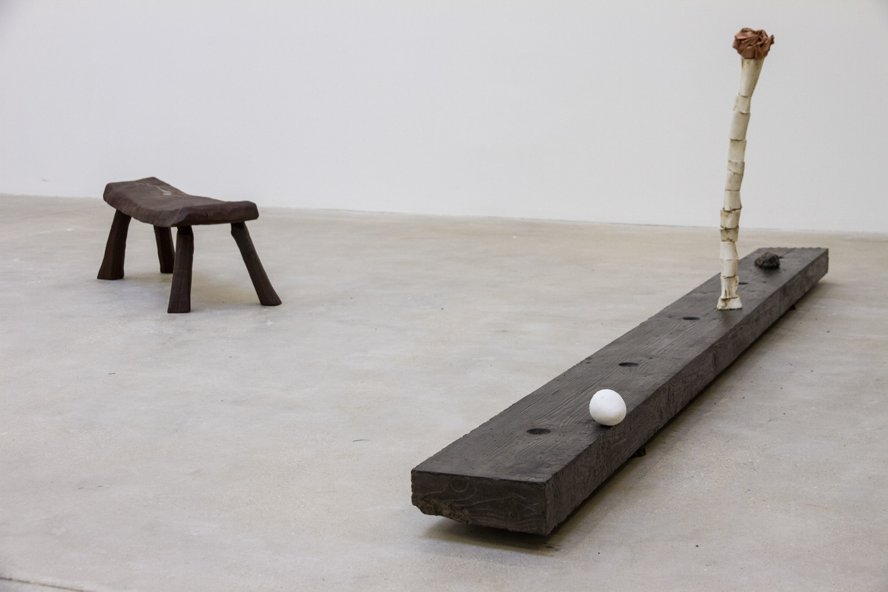 Misery Farm: Arrangement Three, 2012Concrete, Hepworth brown concrete colouring, Carnauba wax, lanolin, carbon black200 x 250 x 3000 mm  Details of individual works within arrangement:  My anus is swollen, large and bruised. It reminds me of a rose, its bloom nearly over, petals wide and open and ready to fall at the slightest touch, not like the tight spring bud I remembered. 2015Kurotani #6, squirrels’ blood, pigs’ blood, lambs’ blood, oxen’s blood, porcelain, iron oxide, manganese dioxide700 x 100 x 100 mm(bone vase with paper flower)  I won’t give you what you want, 2012Brighton cliff chalk60 x 60 x 100 mm(white egg)  Mother and daughter asleep in the snow, 2012Stoneware, manganese dioxide60 x 60 x 100 mm(large oyster shell)  Time passed, 2012-2015Cast iron, urine500 x 250 x 1000 mm(bench)