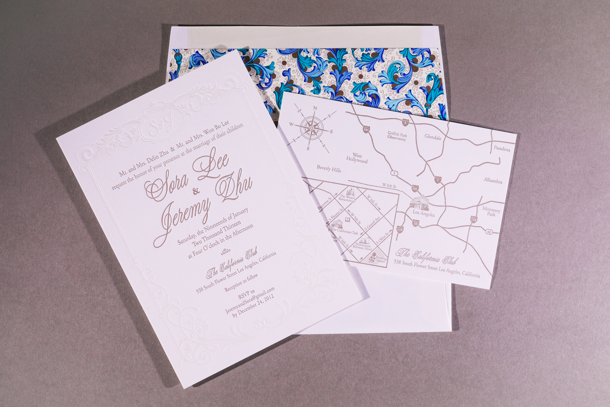 Sora & Jeremy wedding invitation. Letterpress in metallic ink and a light shade on the border. Envelope lined with Italian florentine paper.Paper and envelope Savoy in natural white