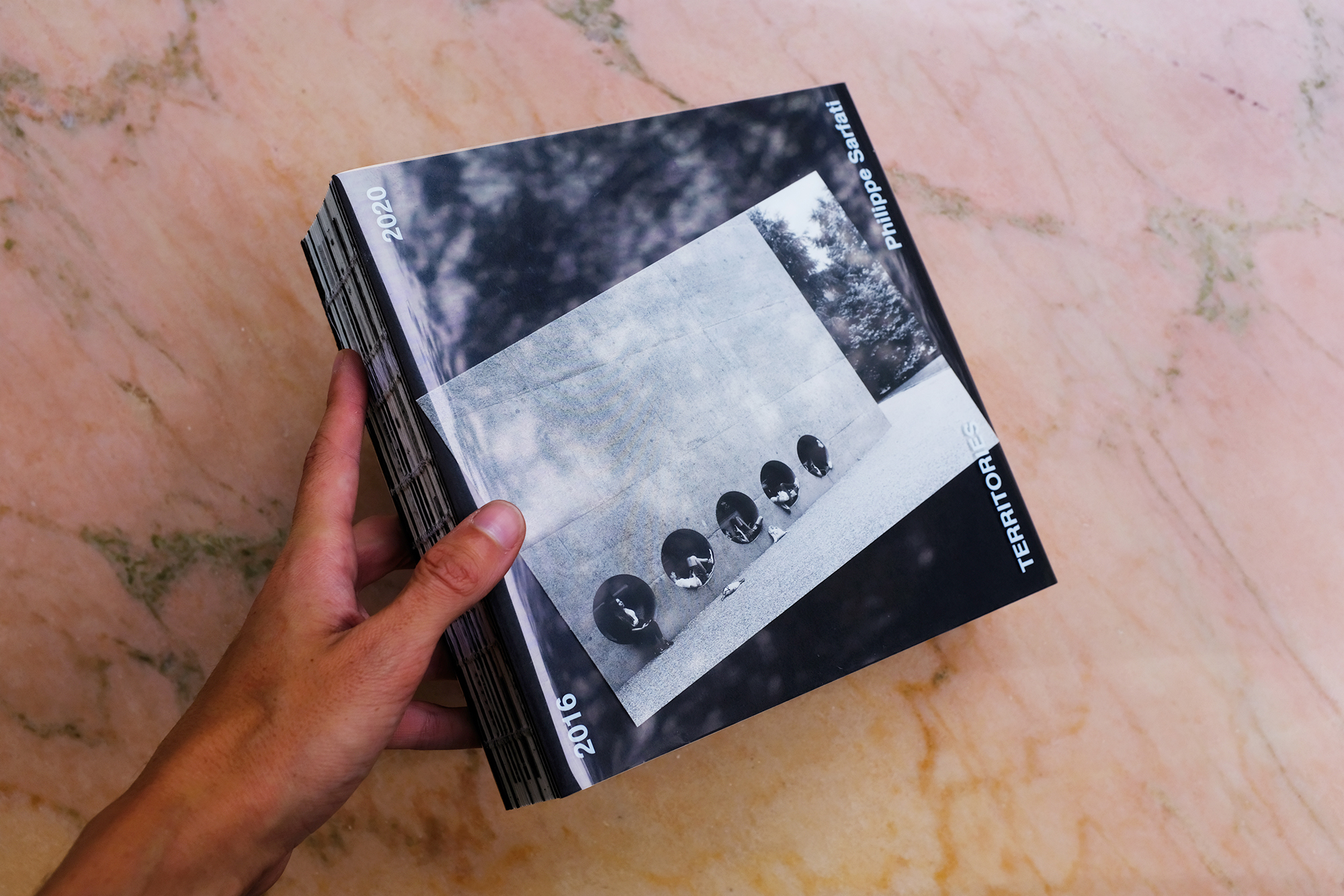 Philippe Sarfati-Territories-photography-photographer-street-documentary-architecture-black-and-white-book-design-cover-arvinius-orfeus-kickstarter-reflection-hand-moving-shiny-pink-marble