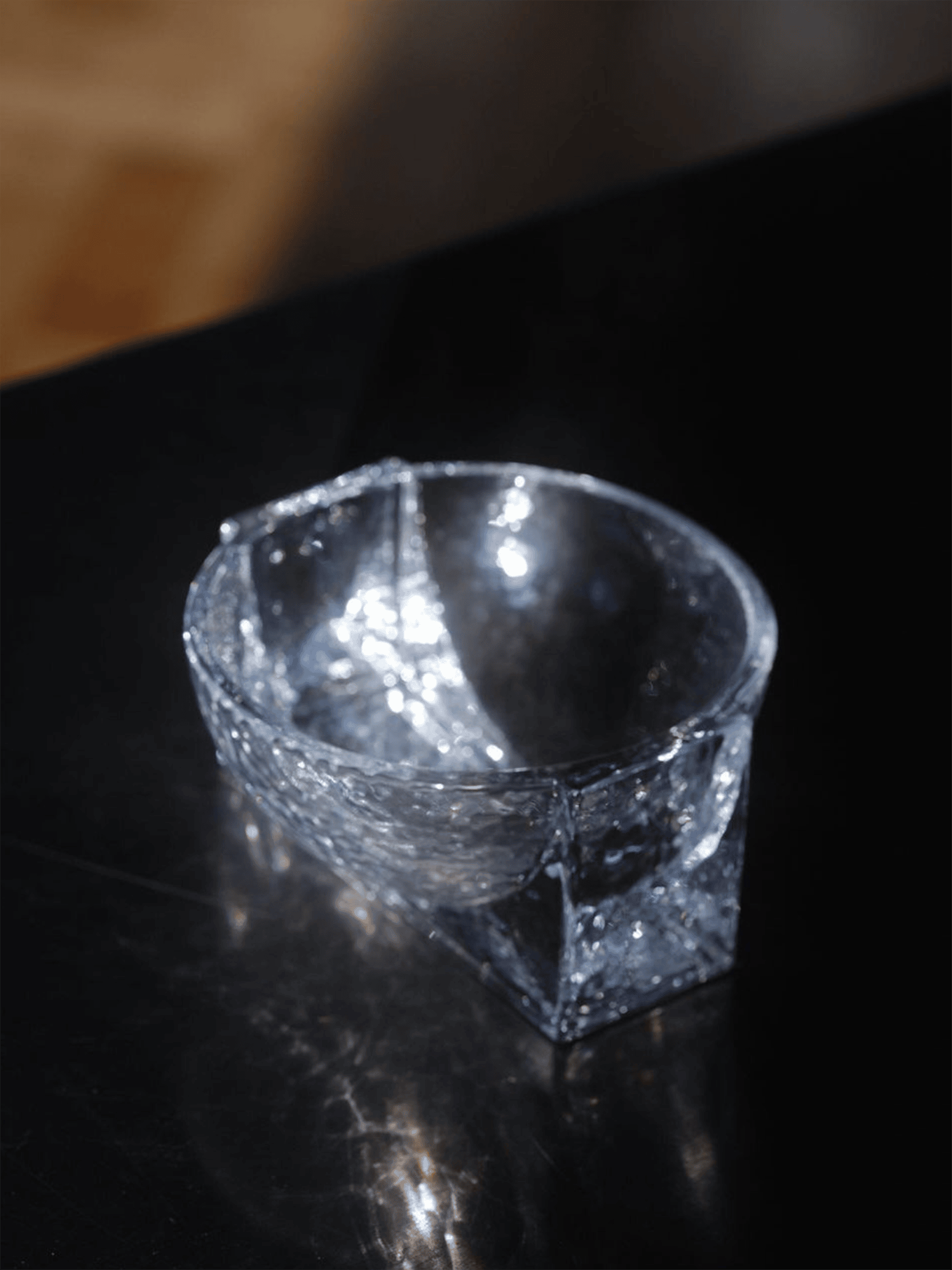 FORMA FOR HOLMEGAARDWith its weighty, sculptural constructions in solid glass, Forma is a product series rooted in the historical Bauhaus era, where shapes like cubes, spheres, and cylinders served as primary design elements. Forma embodies the same graphic strength through massive geometric shapes intersecting with one another. This bold design language engages with the negative space surrounding the structure, influencing how the brain interprets the fusion of forms.Designed in collaboration with Laura BildeGo to product page →