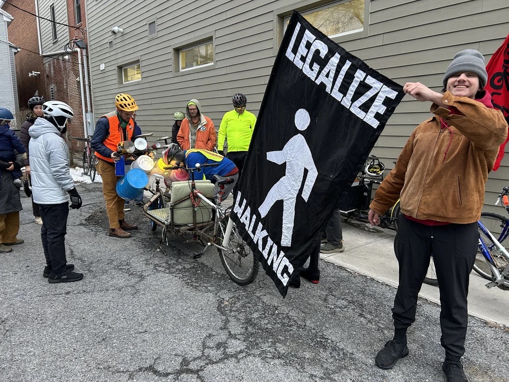 A custom-made drum bakfiet bicycle was played during the parade, then assembled for display in the gallery.