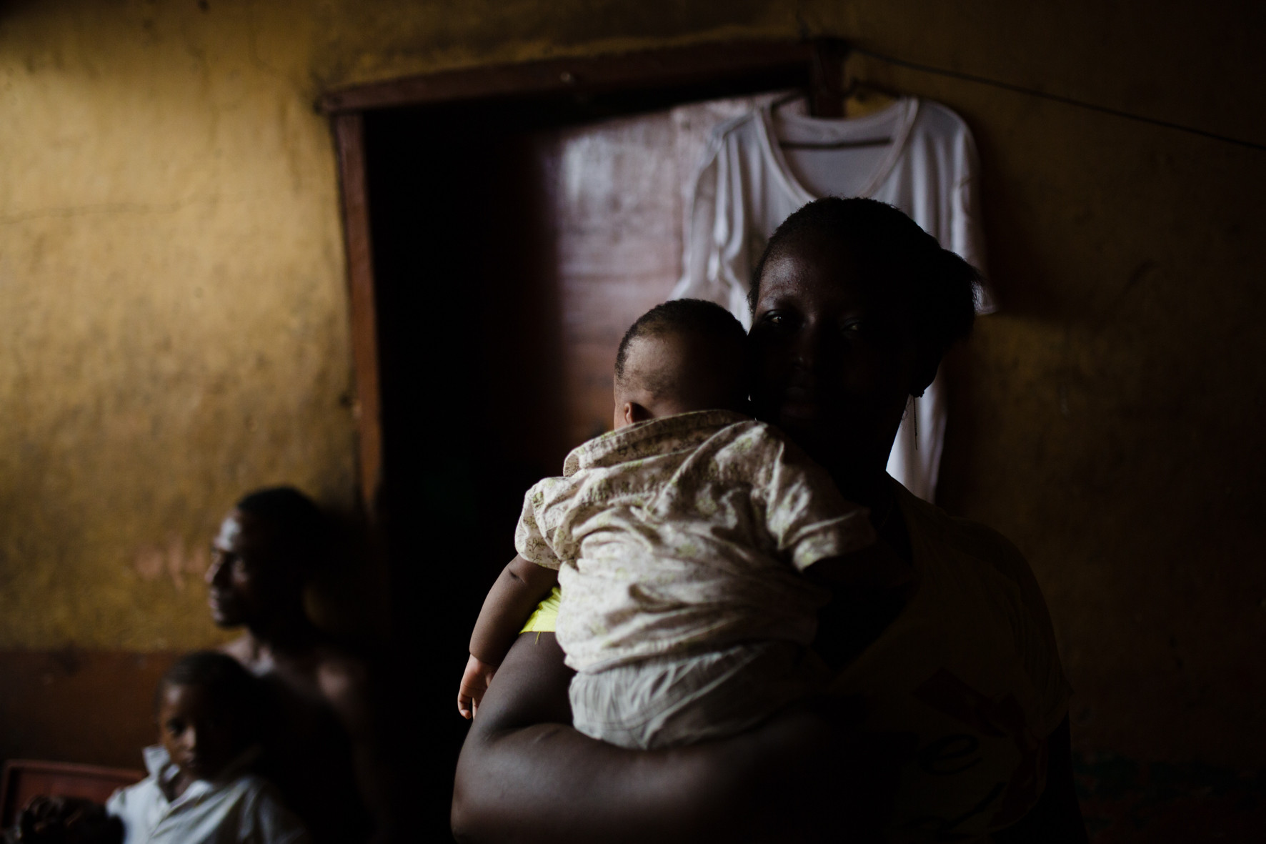 Haja survived Ebola but is tired of talking about it. Wounds are not healed. She lost many family members, among them her husband and two children. Haja was treated in the Ebola Treatment Centre in Kenema, and after her recovery she started volunteering. She named her newborn baby after a Red Cross worker who has been helping and supporting her throughout the aftermath of the recovery. 