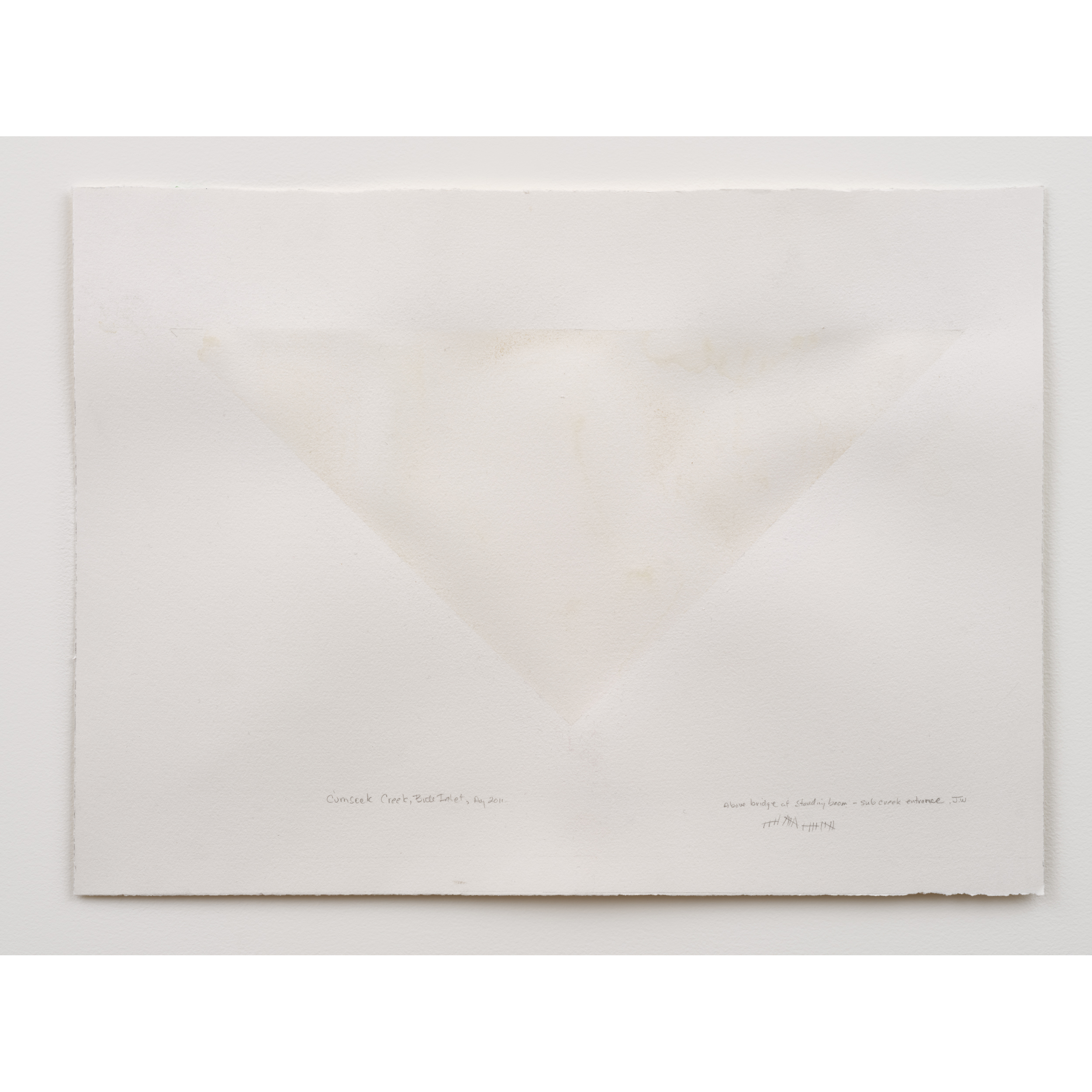 Judith Williams, Cumsack Creek (inverted triangle), 2011. 38 x 53 cm / 15 x 20 1/2 in. Creek water on paper (20 layers). Collected in August, 2011 by JW. "Above bridge of standing boom&ndash;subcreek entrance."