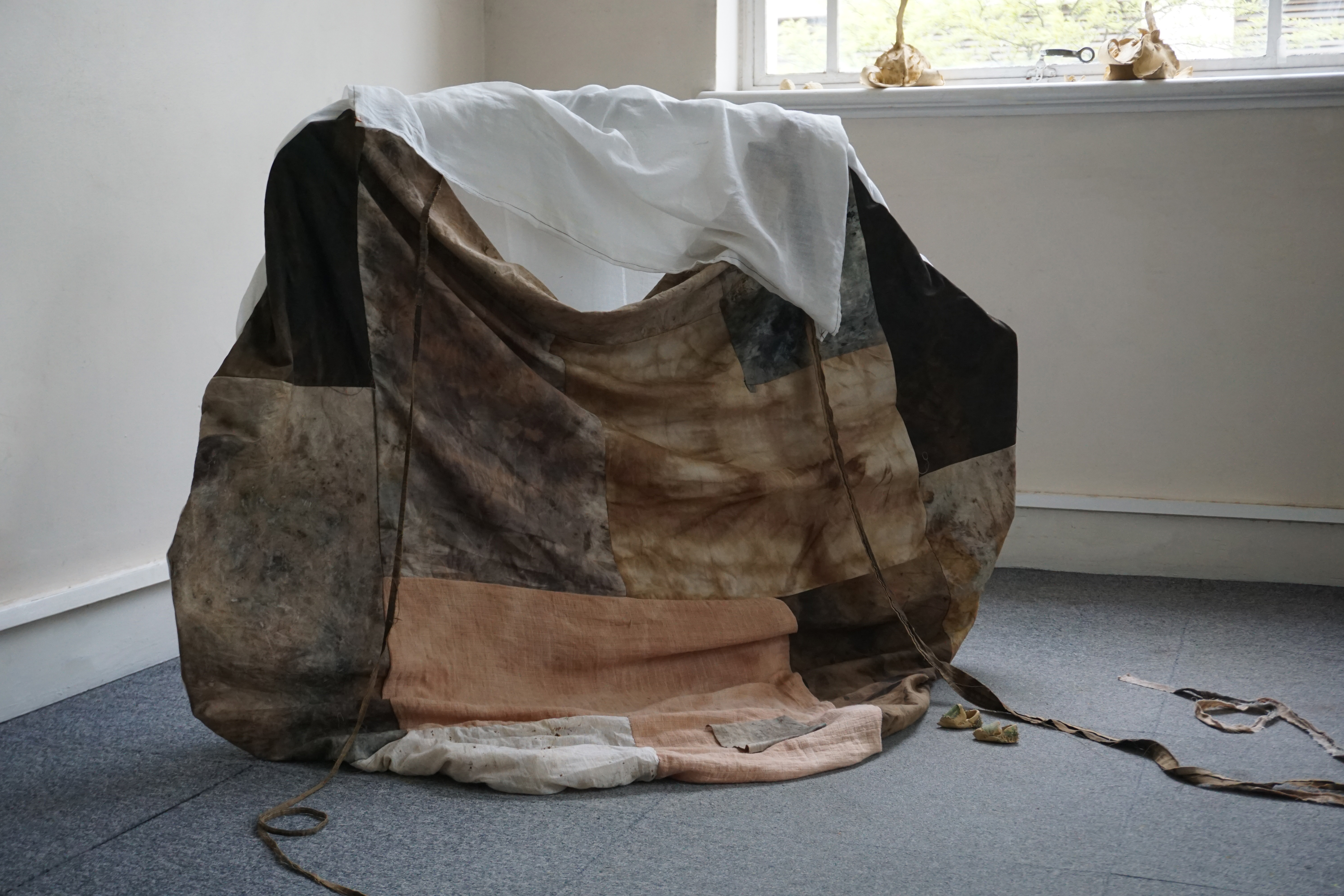 'Perchance to be Pixie-Led', Devon clay, naturally dyed textiles made collaboratively with young people from National Saturday Club at Kingston Uni, 2023