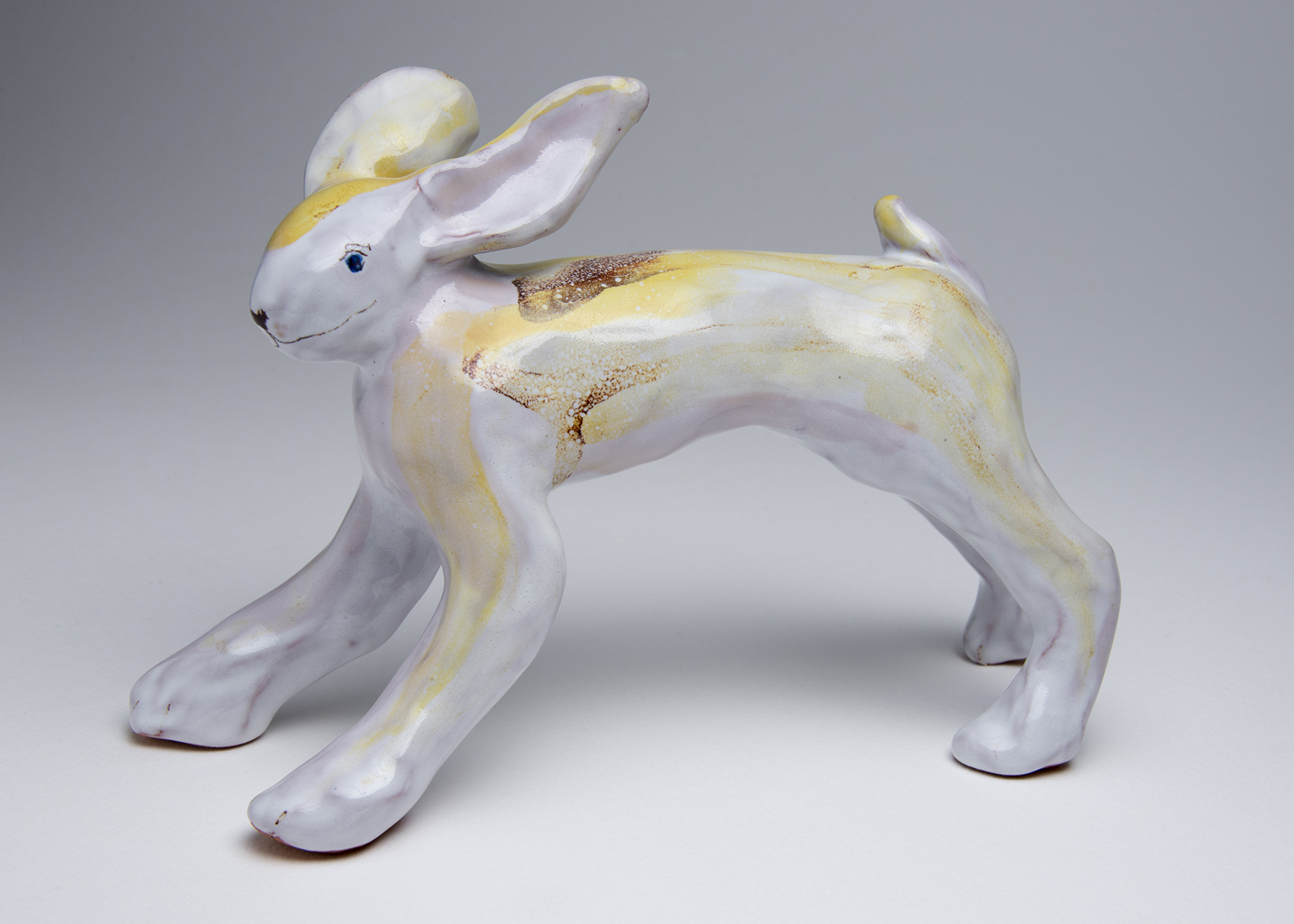 Running hare in yellow. 14 x 20cms £320