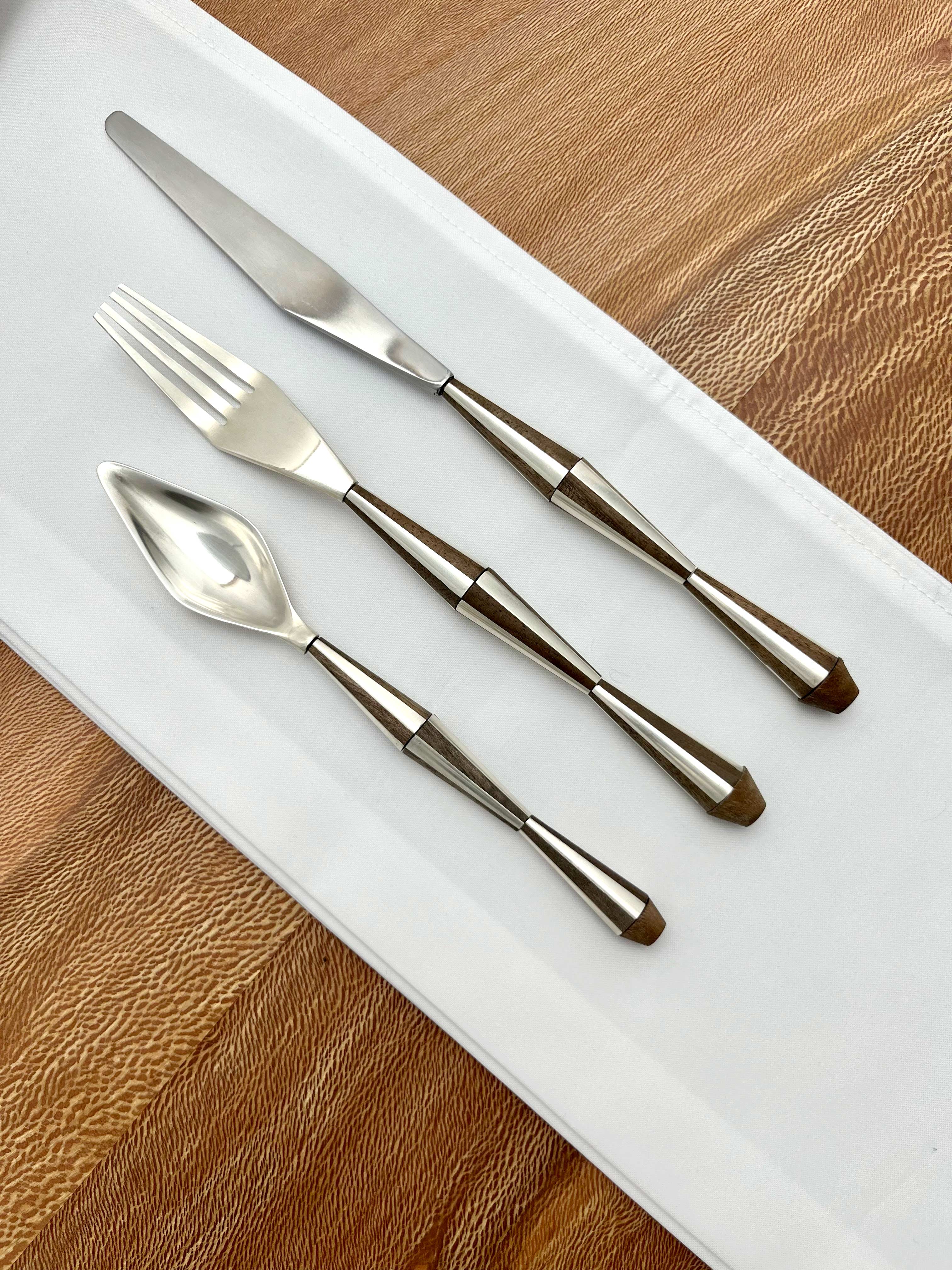 Prototype Cutlery • Silver, Black Walnut, Stainless Steel • 2024 Designed for: Prototyping Creative Circularity for Luxury Tableware, a research project by Maison/0,  the collaborative platform set up by Central Saint Martins and the luxury group LVMH to prototype regenerative luxury via design-led research.