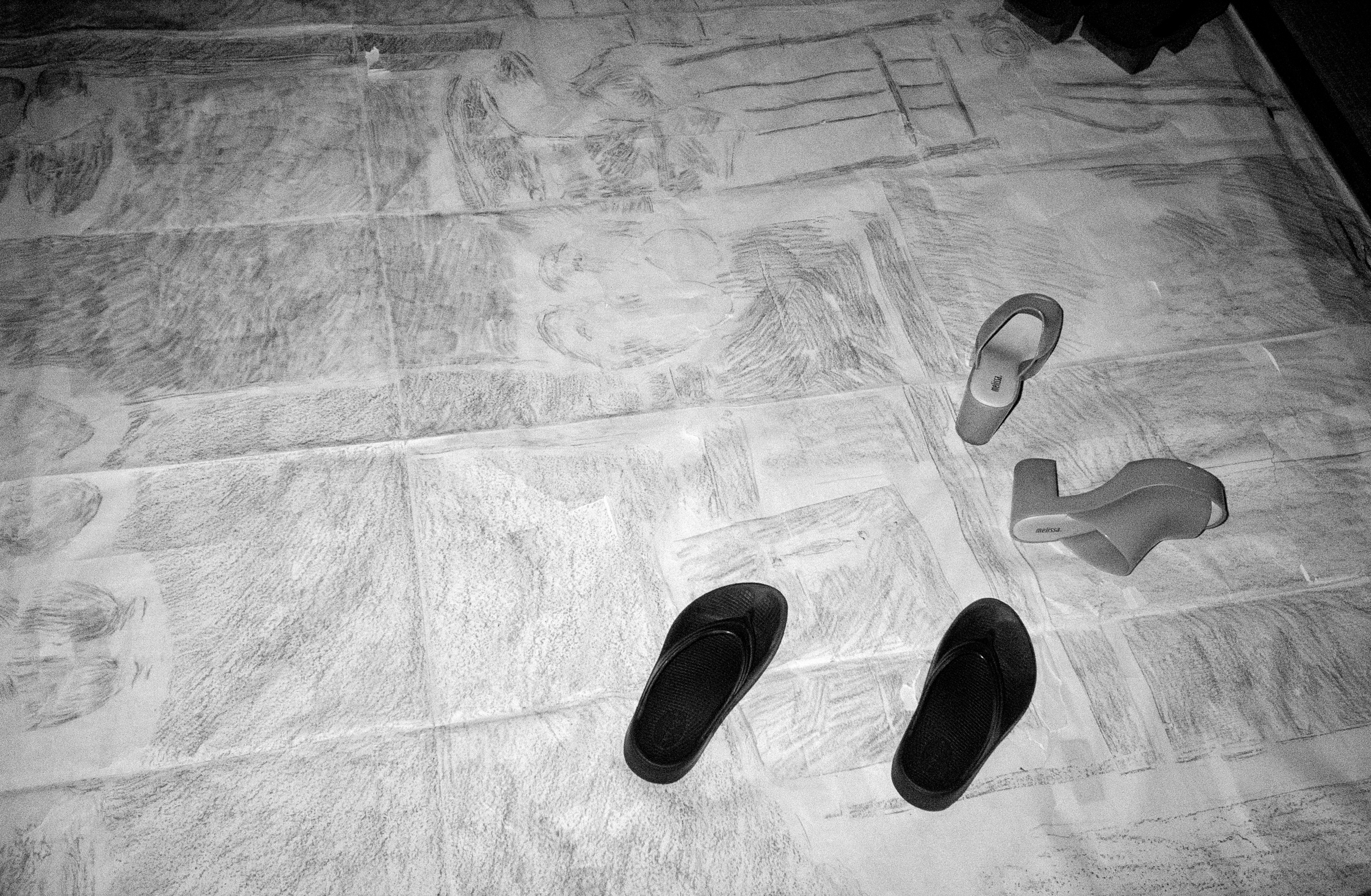'Green replica of my imagination / genkan' installed in Tokyo with attendees shoes