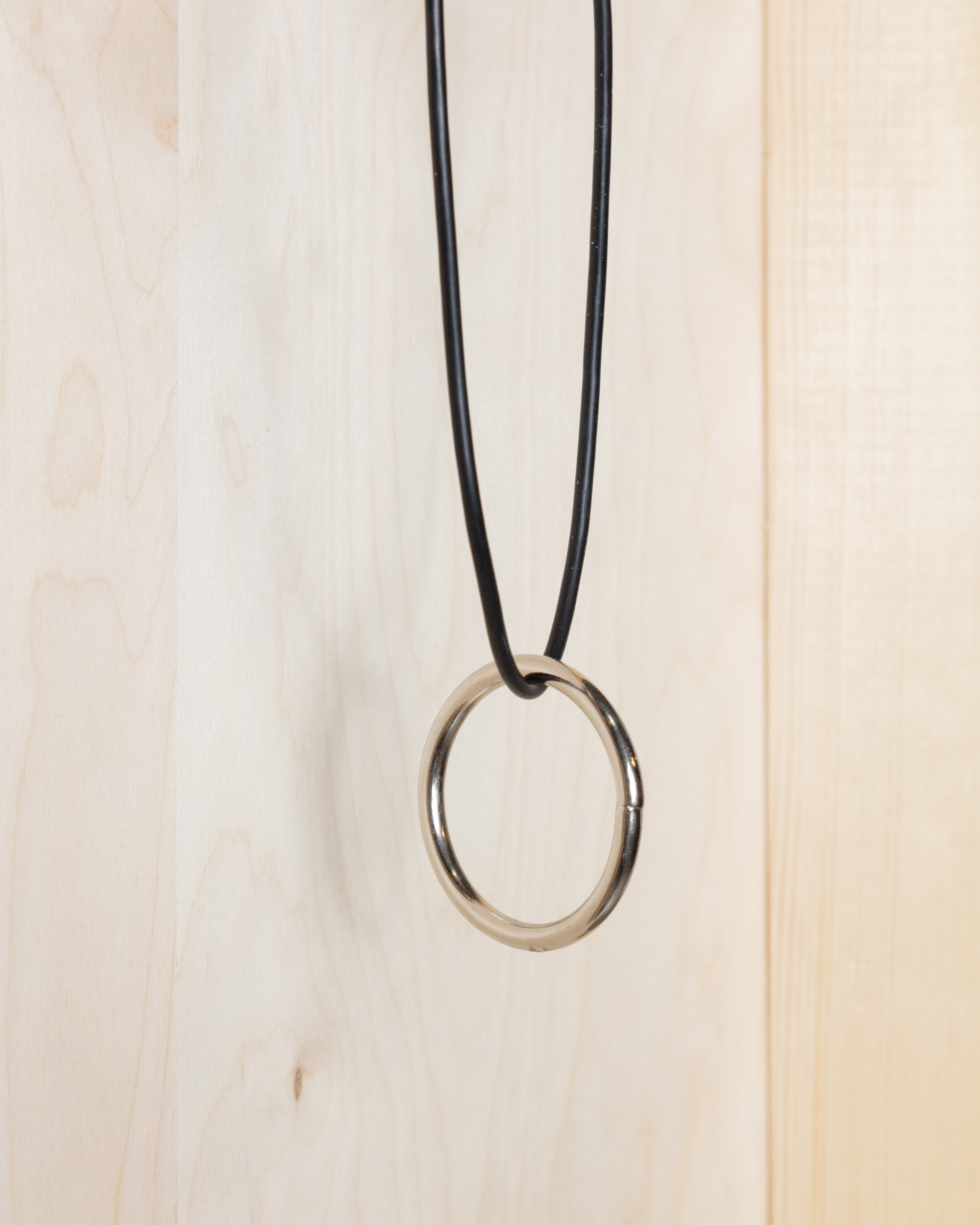 Cabling detail: usb cable, steel ring, Photography: Teiko Ang Zheng