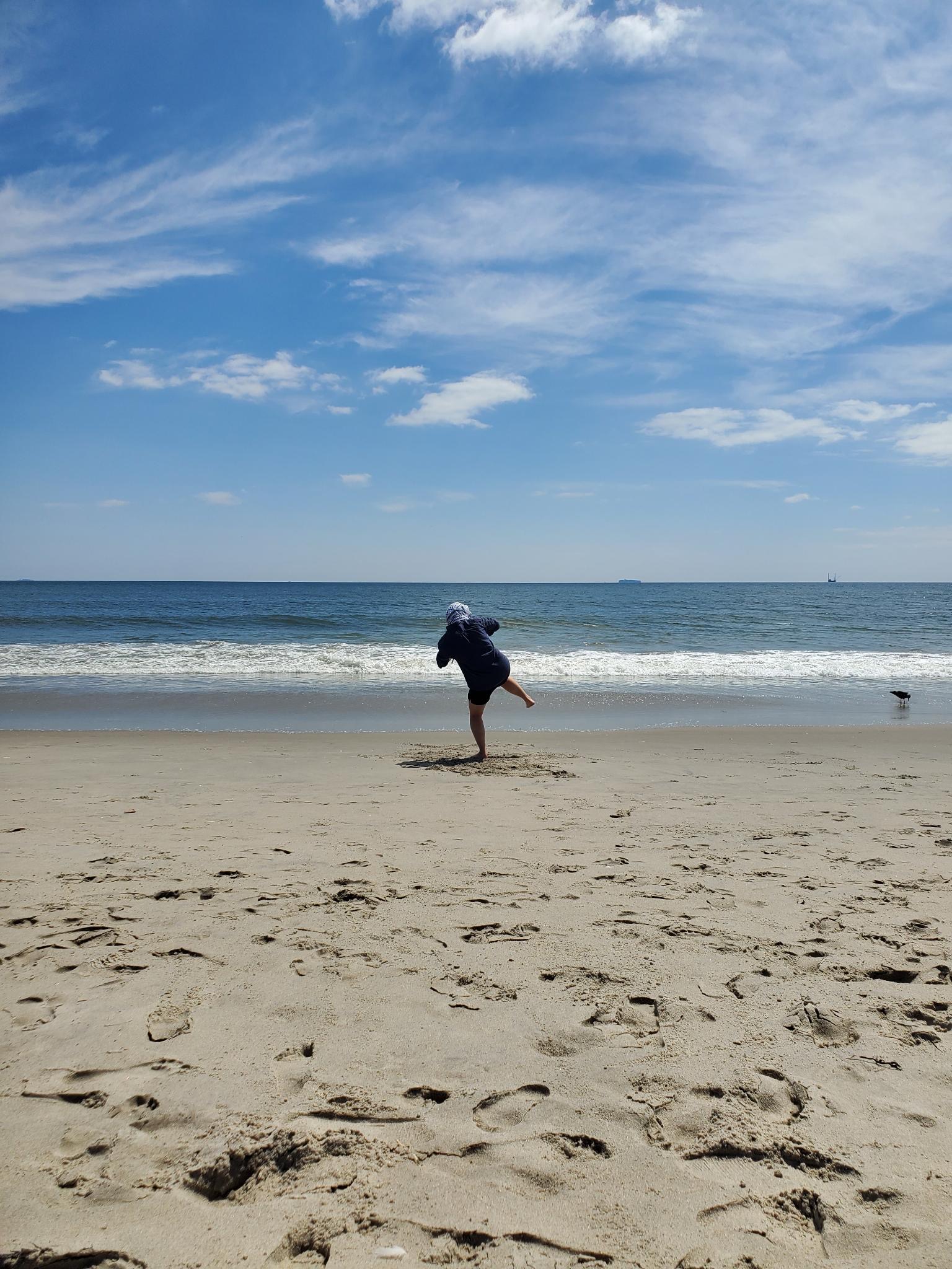 Practicing Wing Chun at Jacob Riis Beach, wearing a Palestinian kufiya.  Photo by Colin English. August 21, 2023.