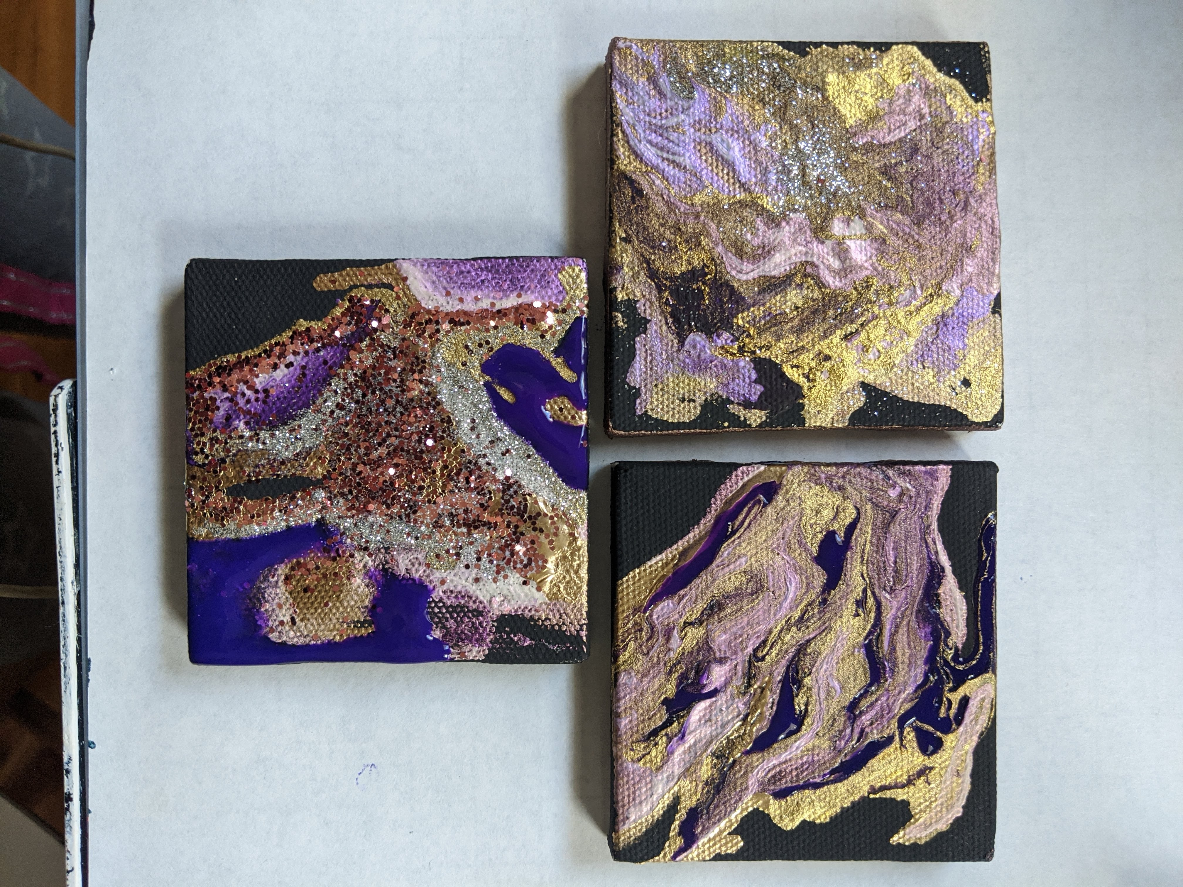 Untitled (lights beneath the lids) Stretched canvas, acrylic paint, glitter 2x2in (x3)