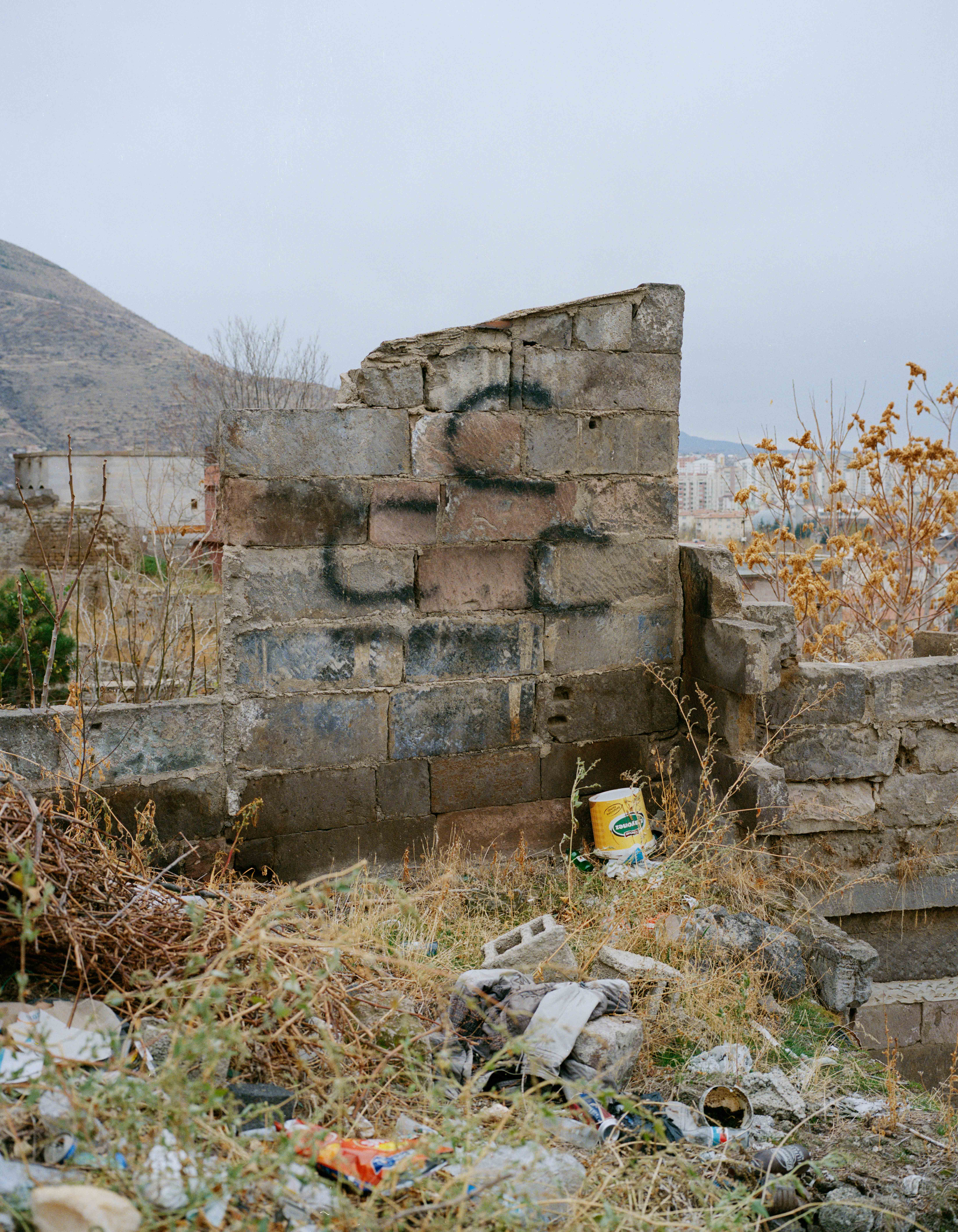 Tag of the MHP, racist and ultra nationalist party, on the ruins of an armenian home in Talas, Kayseri district, Anatolia.
