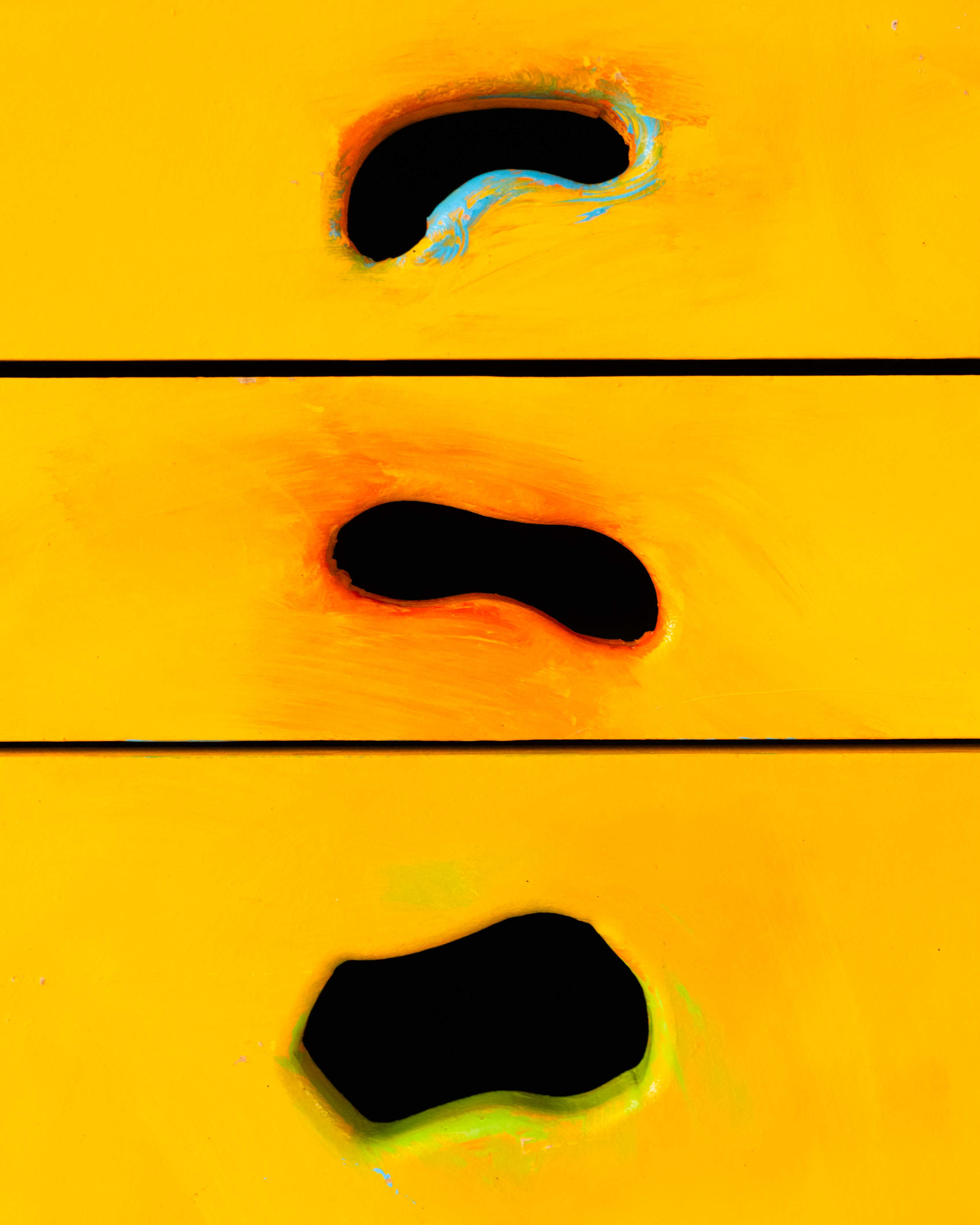 three handles in the colors blue, orange, and yellow on the tbwa/chiat/day Gaetano Pesce 5 drawer rolling cabinet shown in the time/imbalance exhibition by sweeterfat July 1st 2025