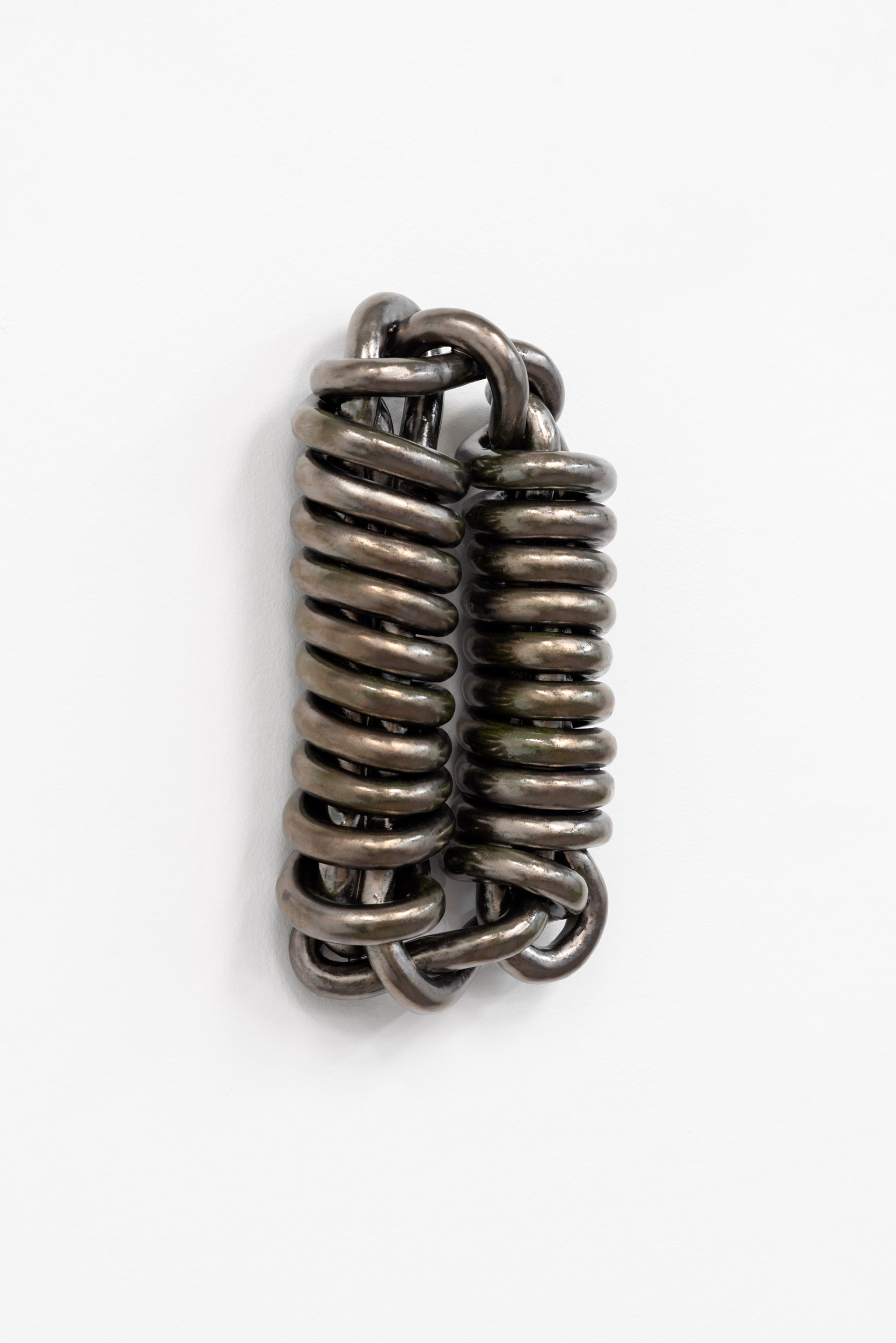 Nicole Ondre, Volute, 2024, 14”x 7”x 3”. Glazed ceramic.