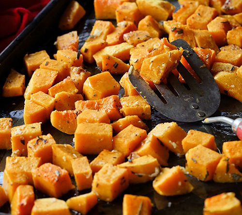 an up-close picture of bright orange roasted butternut squash