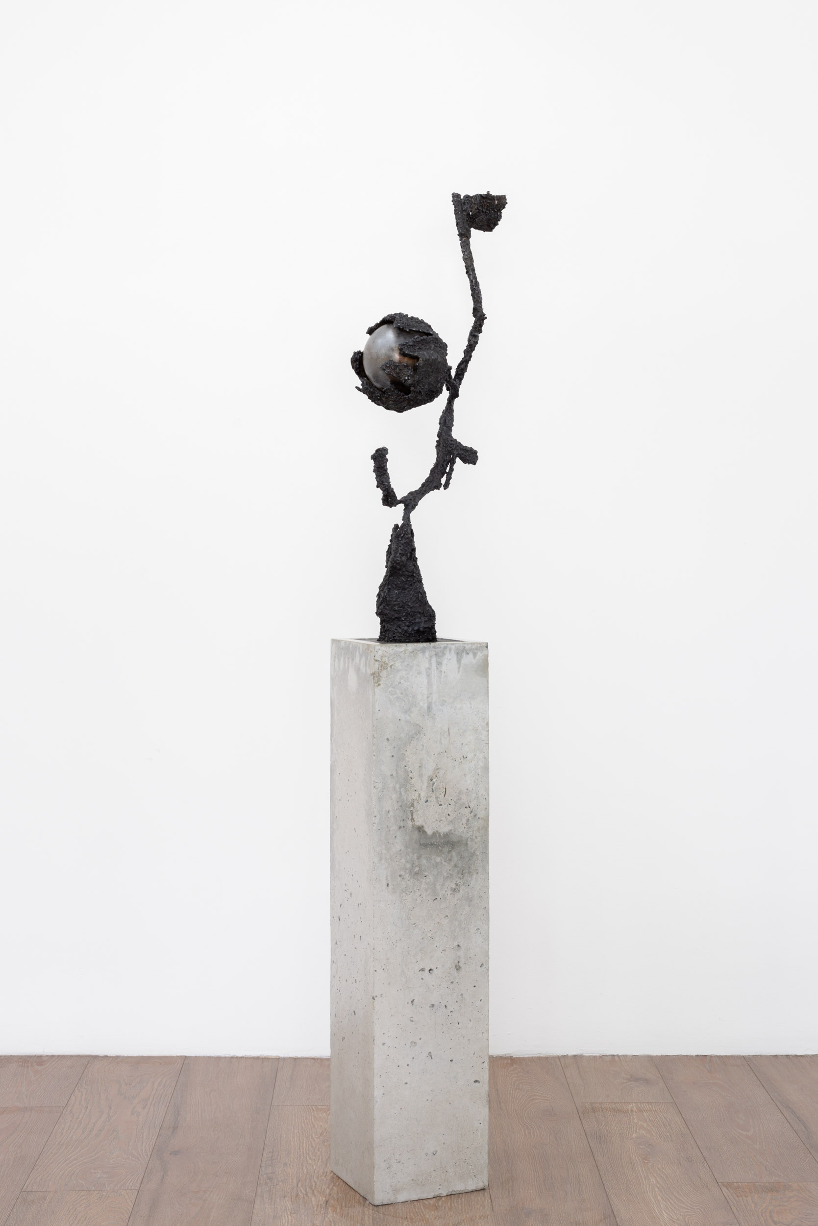 Ronan Stewart, Husk (H), 2025, 30” x 8” x 12” / 76cm x 20cm x 30cm, steel; Plinth: 36” x 8” x 8” / 91.5cm x 20.5cm x 20.5cm, portland cement, sand, pea gravel, fibreglass shards.