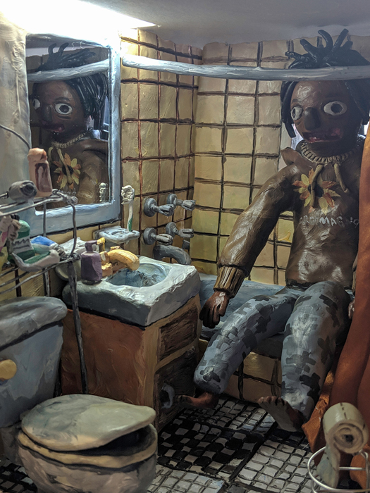 Kahlil Blu's “11”, 2019. 8" x 10" x 7.25". Polymer clay, acrylic paint, wire, fabric.